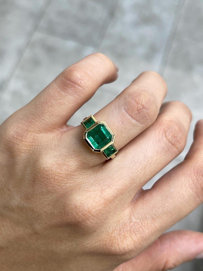 Modern 4.08tcw 14K Asscher Cut Emerald Three-Stone Ring - Rich Green Bezel Set Gold For Sale