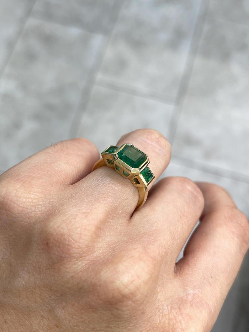 Women's 4.08tcw 14K Asscher Cut Emerald Three-Stone Ring - Rich Green Bezel Set Gold For Sale