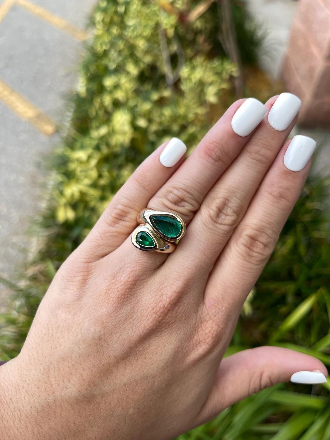 Modern 4.08tcw Dark Green Tear Drop Emerald Bypass Two Stone Bezel Statement Ring 14K For Sale