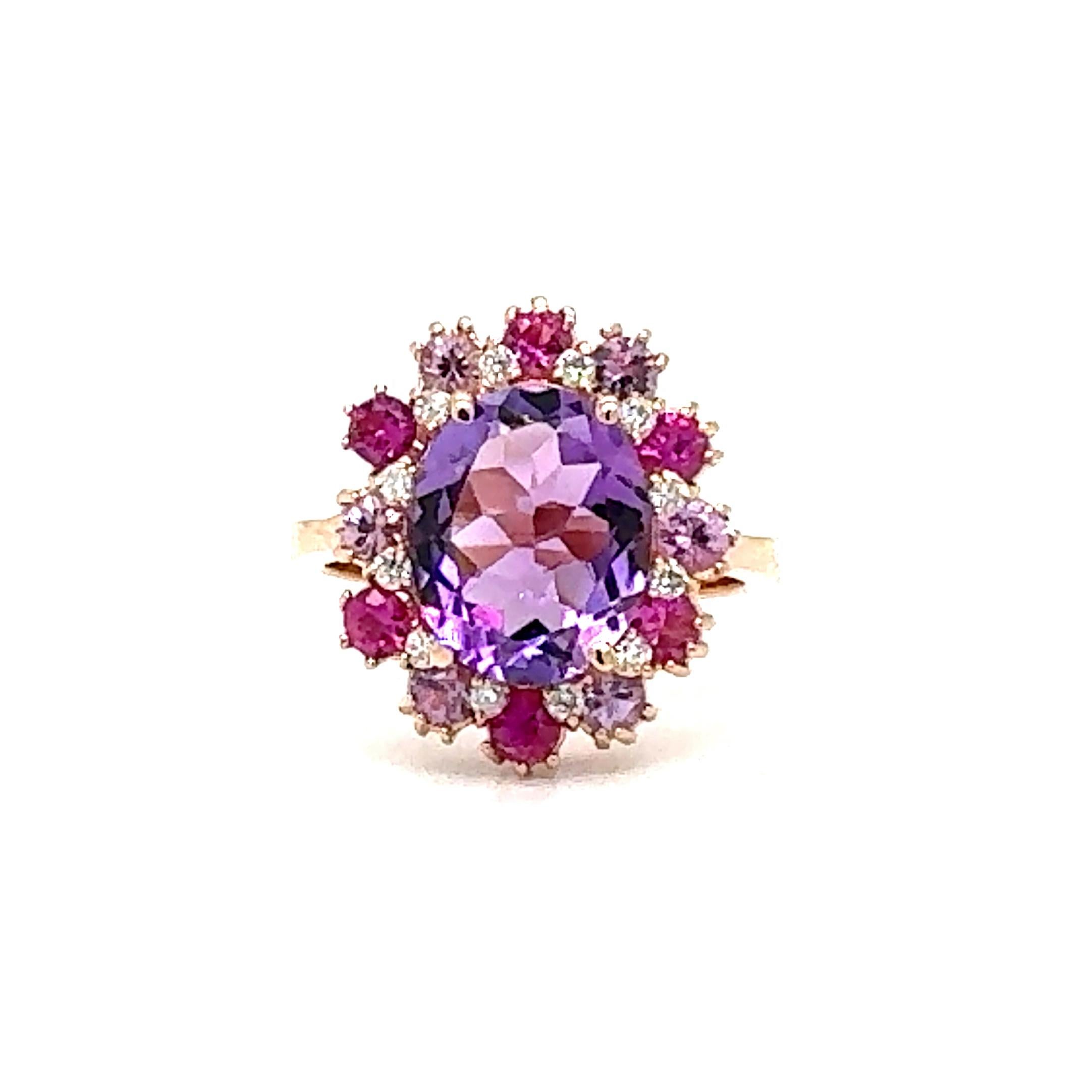Amethyst, Pink Sapphire, and Diamond Cocktail Ring! 

Playful yet Powerful! Its like having a piece of glittery candy on your finger! This ring has an Oval Cut Amethyst that weighs 2.85 Carats and is embellished with alternating 12 Light and dark
