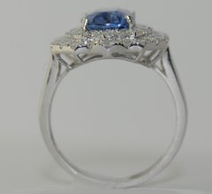4.09 Carat Blue Sapphire and 1.37 Carat Diamond Women's Ring, 18 Karat Gold