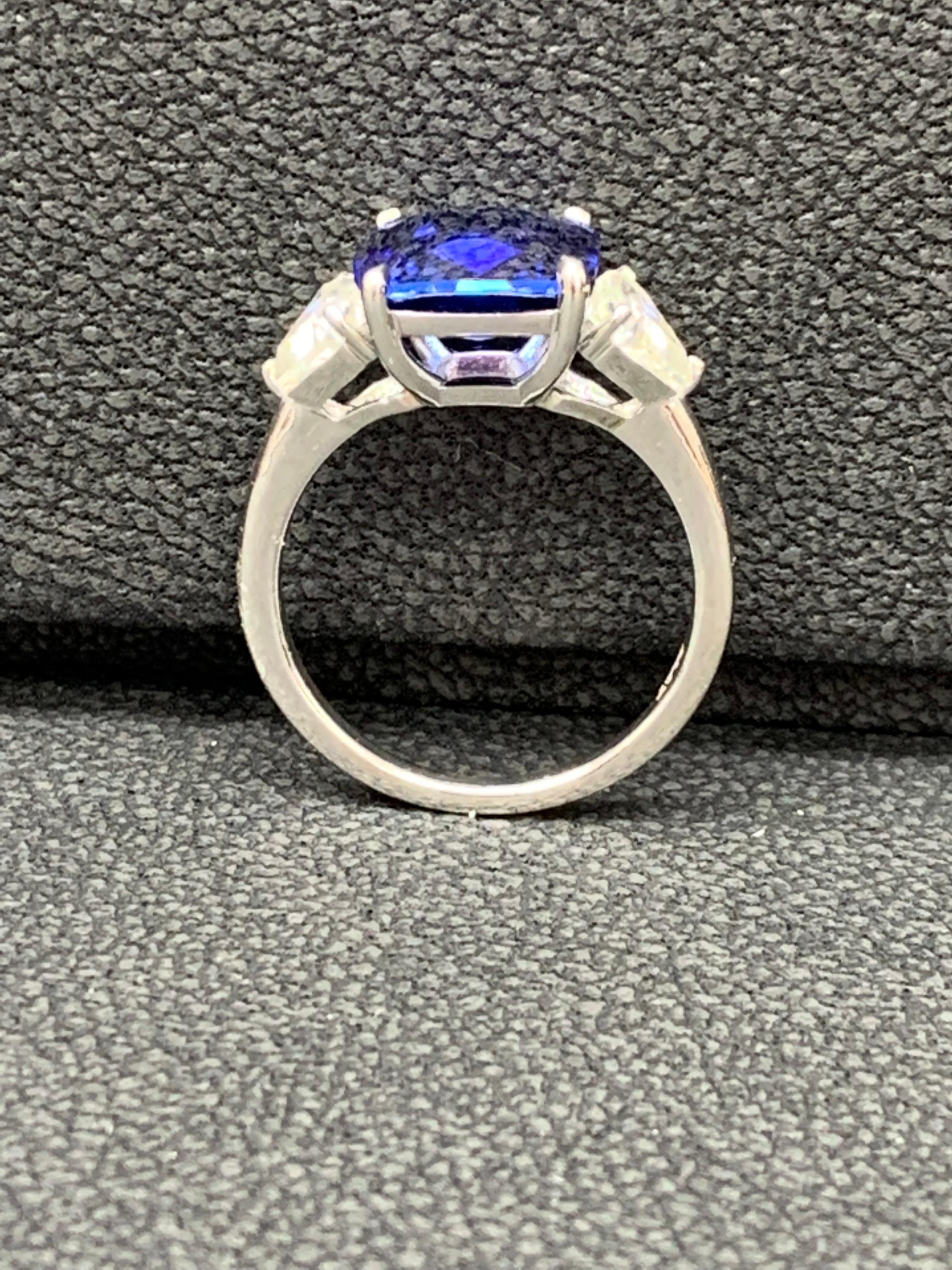 4.09 Carat Blue Sapphire and Diamond Three-Stone Engagement Ring in Platinum For Sale 1