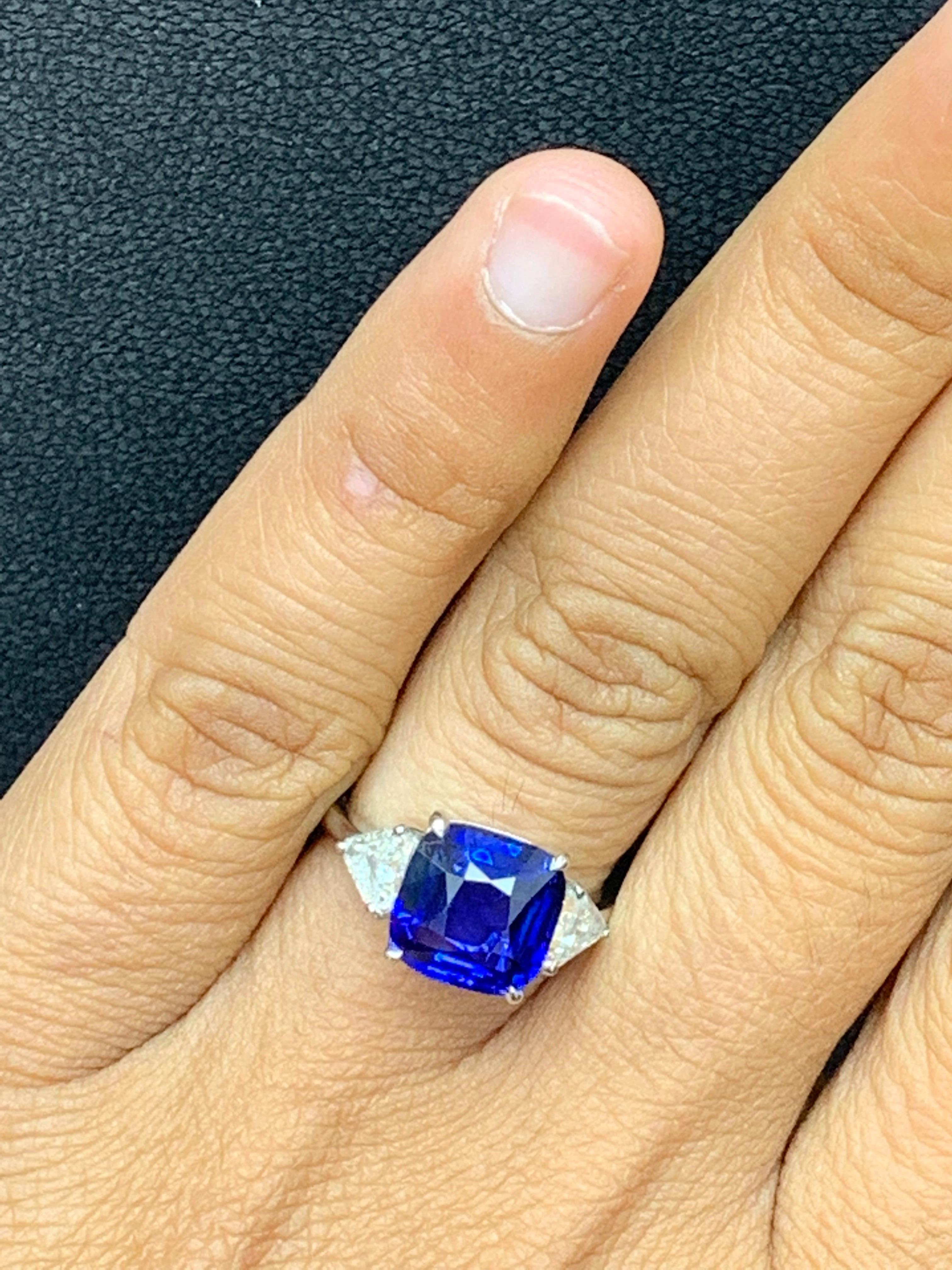 4.09 Carat Blue Sapphire and Diamond Three-Stone Engagement Ring in Platinum For Sale 4