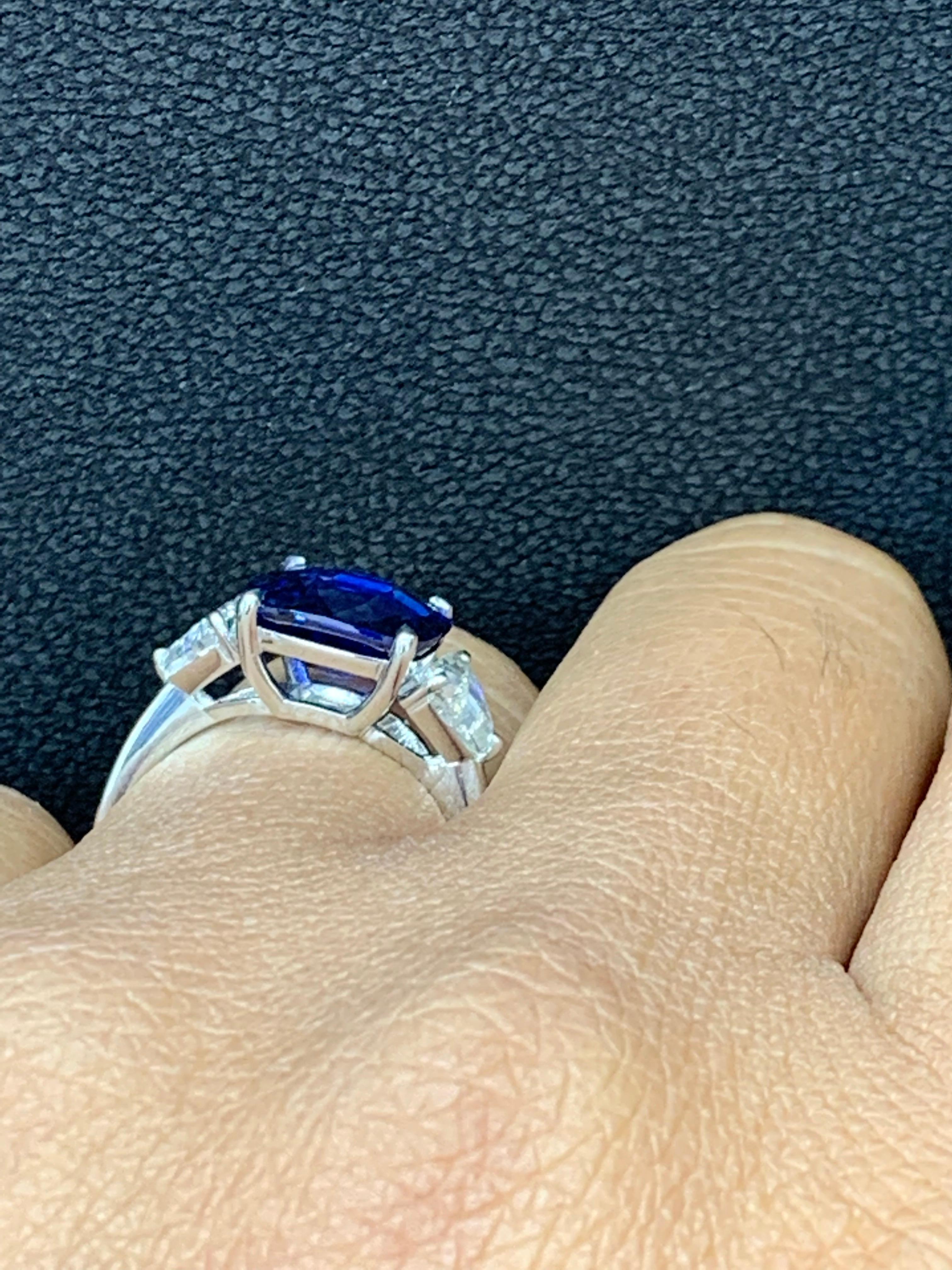 4.09 Carat Blue Sapphire and Diamond Three-Stone Engagement Ring in Platinum For Sale 5