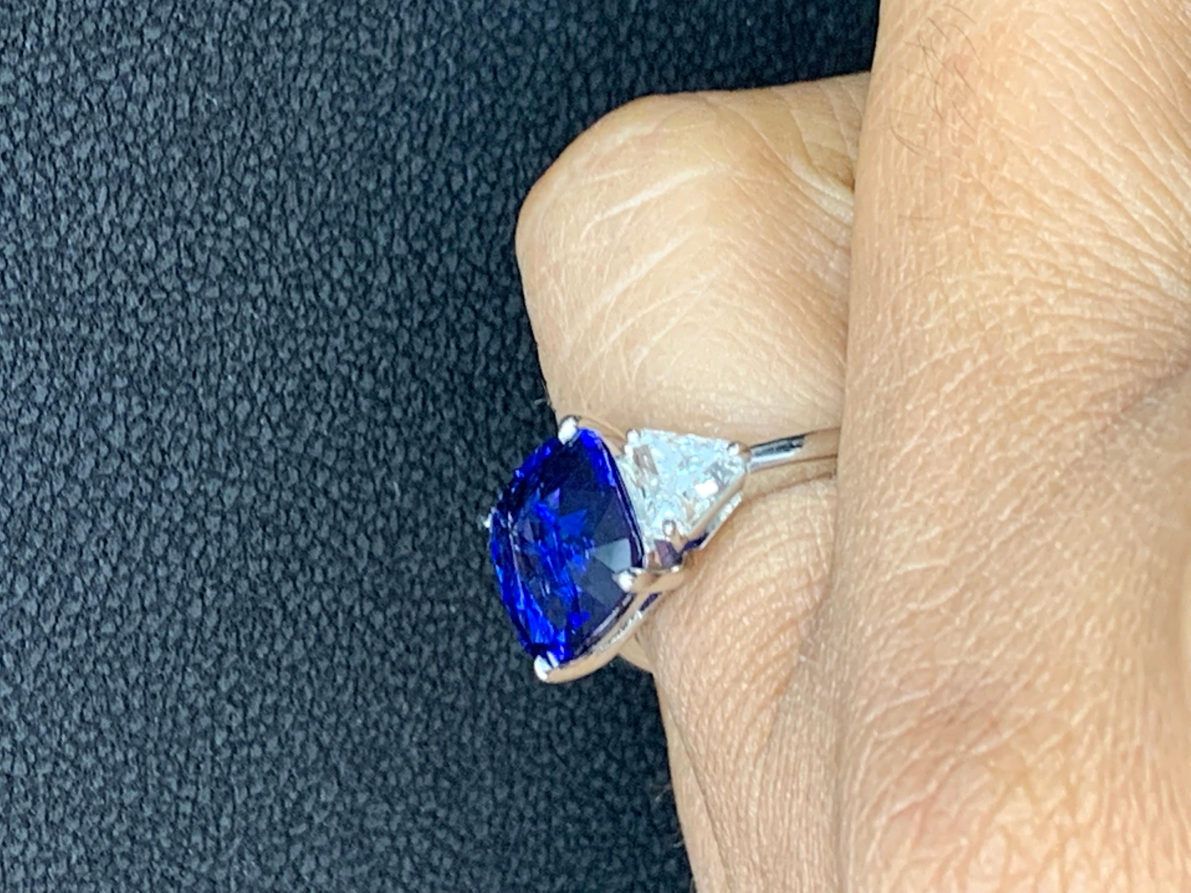 4.09 Carat Blue Sapphire and Diamond Three-Stone Engagement Ring in Platinum For Sale 6