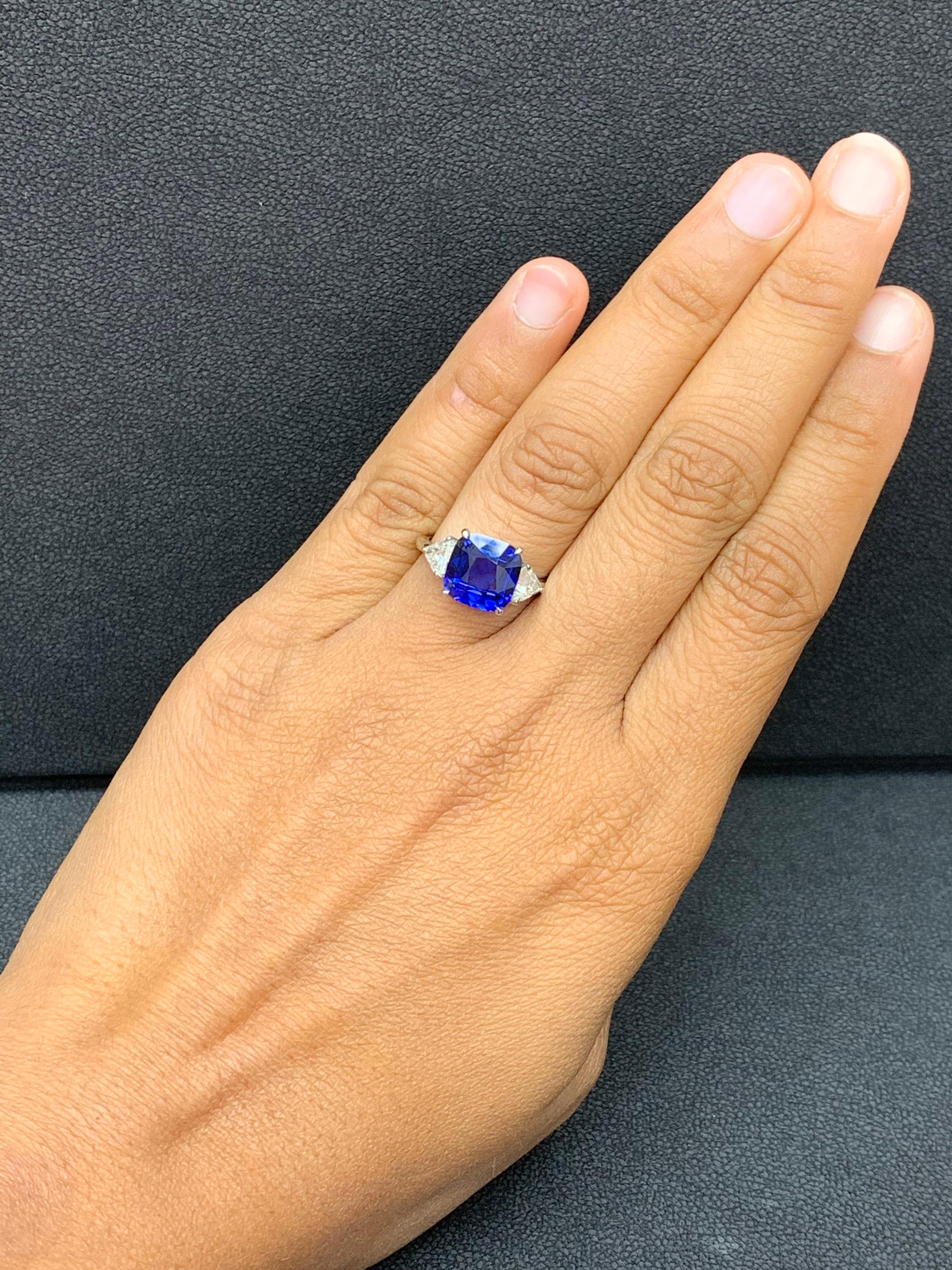 4.09 Carat Blue Sapphire and Diamond Three-Stone Engagement Ring in Platinum For Sale 9