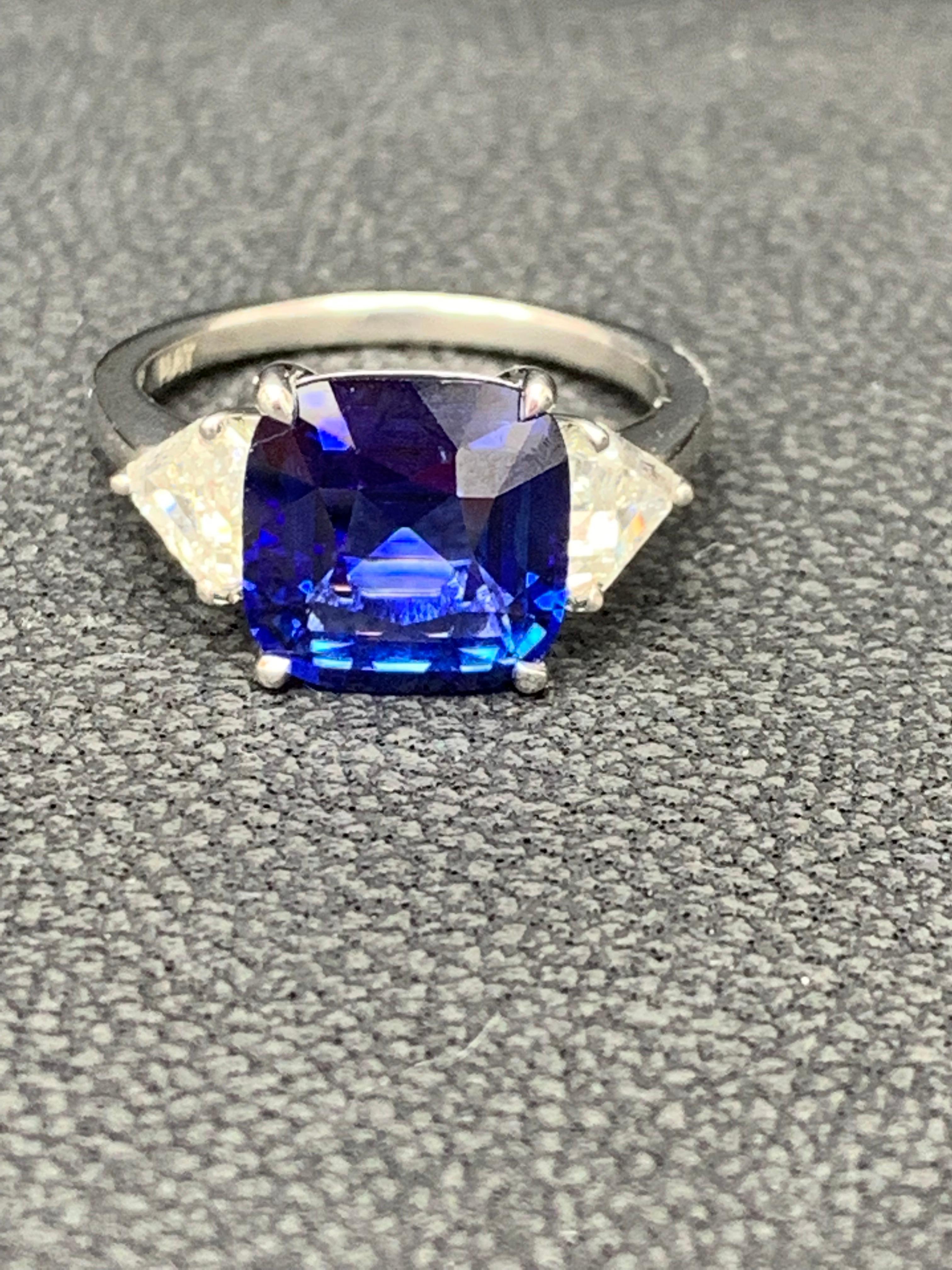 Modern 4.09 Carat Blue Sapphire and Diamond Three-Stone Engagement Ring in Platinum For Sale