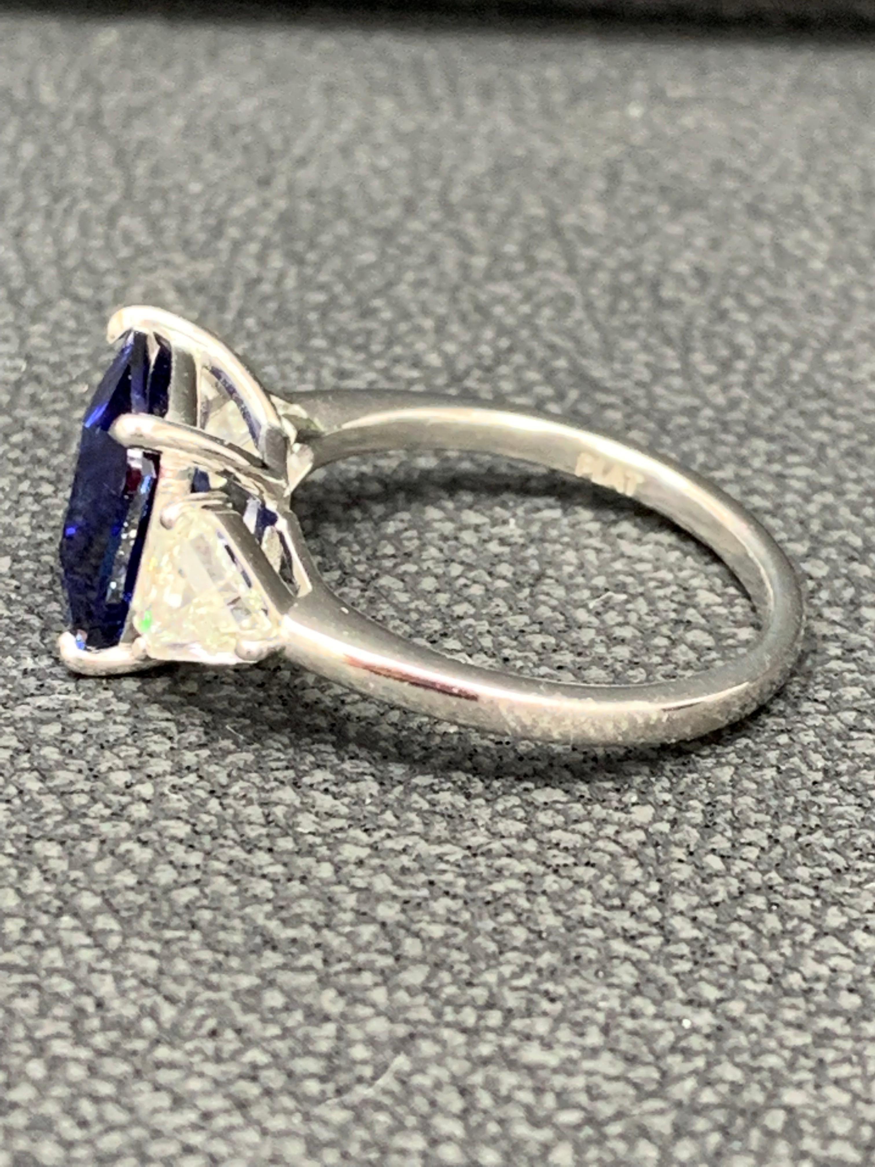 4.09 Carat Blue Sapphire and Diamond Three-Stone Engagement Ring in Platinum In New Condition For Sale In NEW YORK, NY