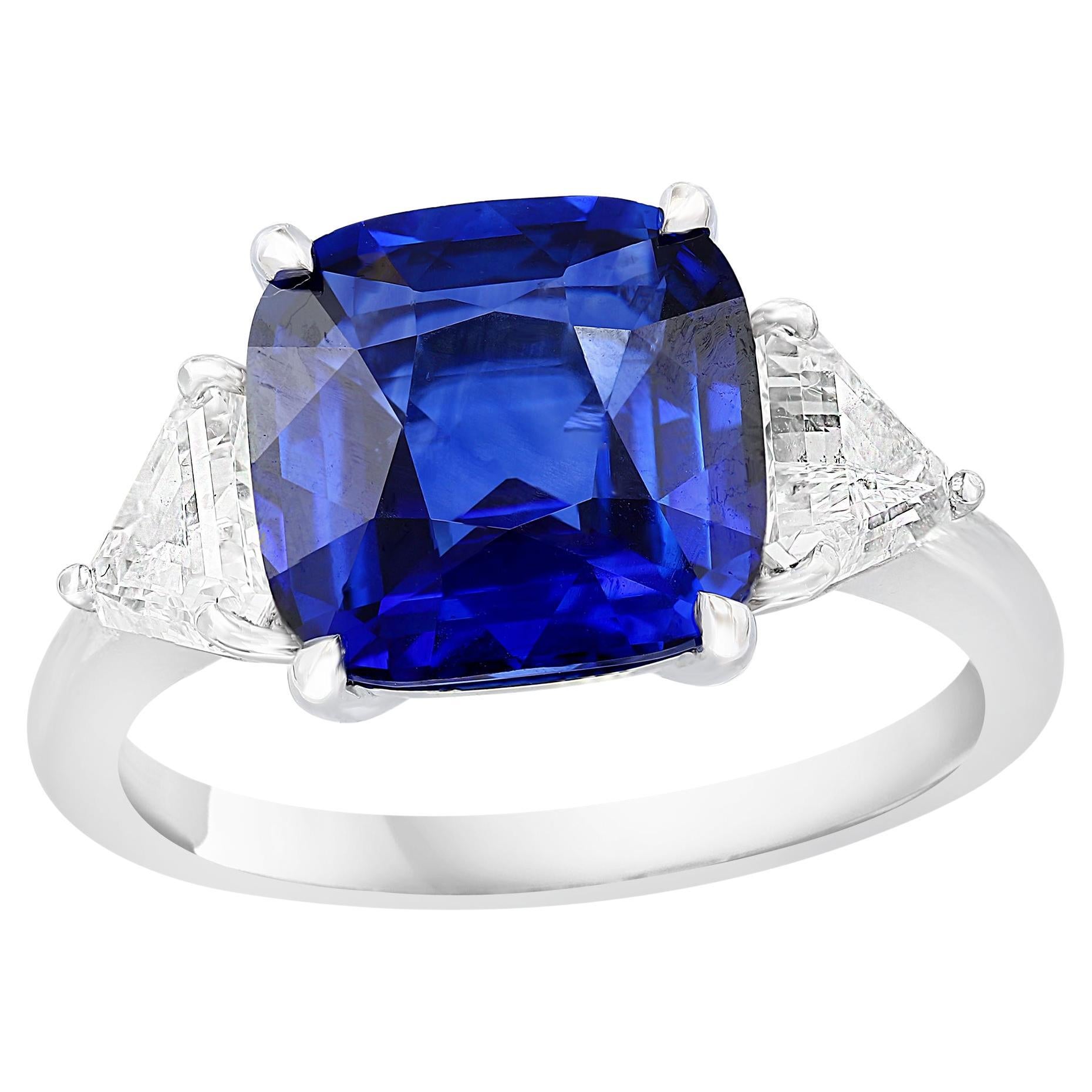 4.09 Carat Blue Sapphire and Diamond Three-Stone Engagement Ring in Platinum For Sale