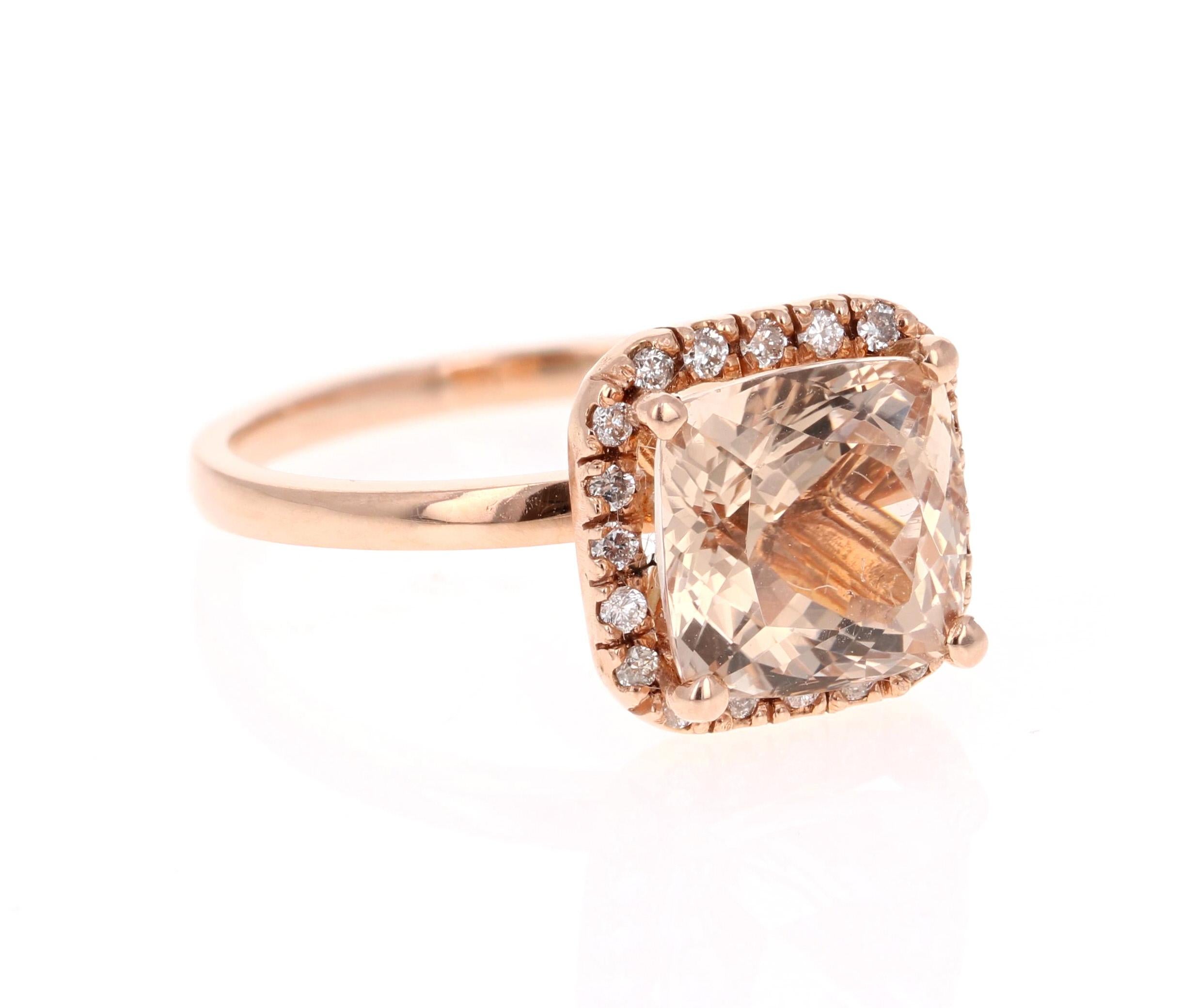 This Morganite ring has a 3.90 Carat Square Cushion Cut Morganite and is surrounded by 20 Round Cut Diamonds that weigh 0.19 Carats. The total carat weight of the ring is 4.09 Carats. 

It is crafted and set in 14 Karat Rose Gold and weighs