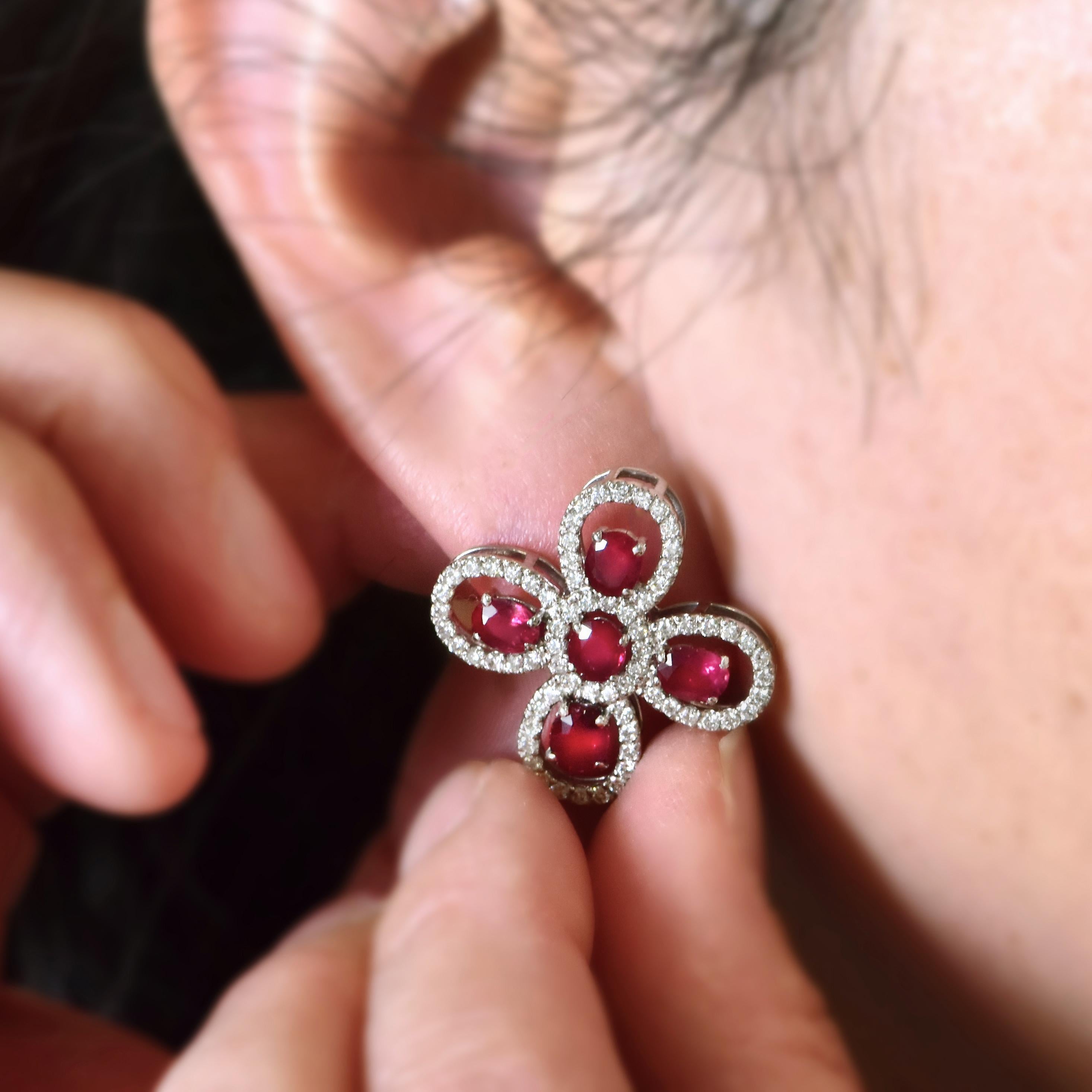 A gorgeous pair of Rubies weighing a total of 4.09 Carats. The diamonds are a further 1.36 Carats. Rubies are referred to as 