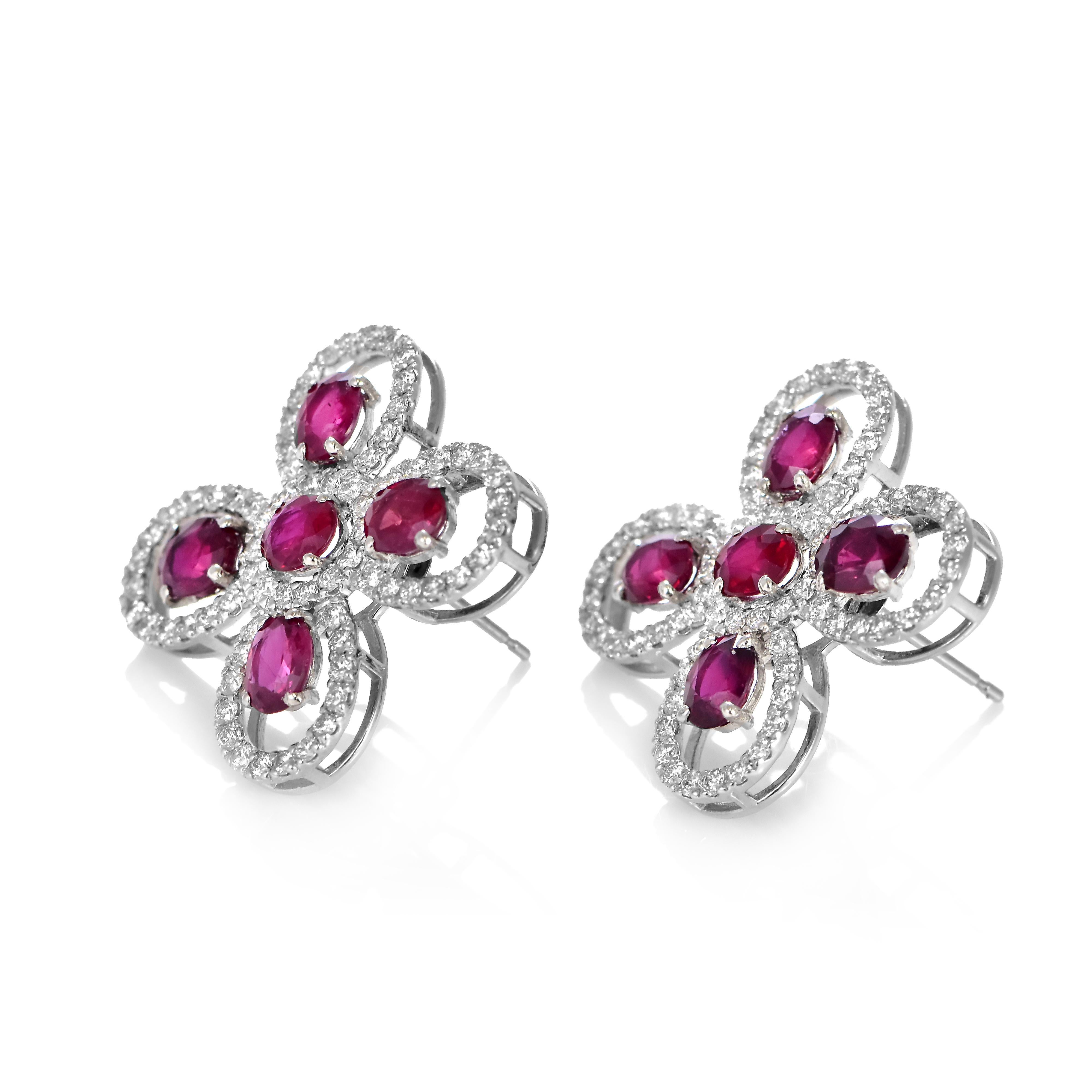 Modern 4.09 Carats Natural Rubies and Diamonds Earrings Made in Platinum For Sale