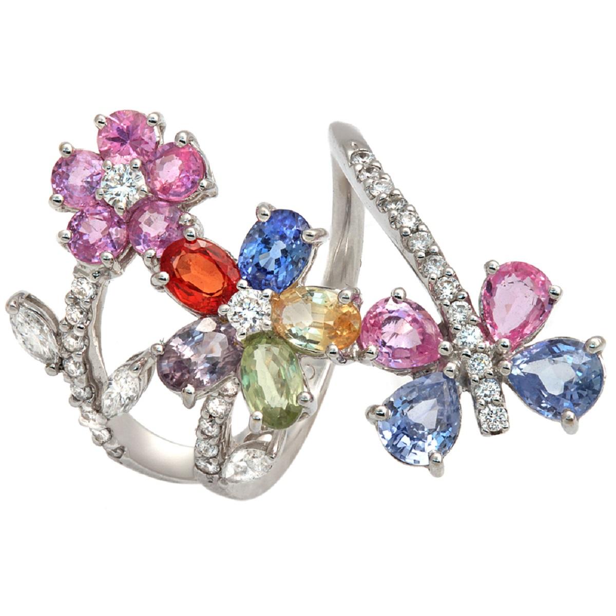 Type: Ring
Top:31.5 mm
Band Width: 2.4 mm
Metal: White Gold
Metal Purity: 18K
Size:6 to 9
Hallmarks: 18K
Total Weight: 6.9 Grams
Stone Type: 4.09 CT Natural Multi Sapphire and 0.36 Ct VS2 G Diamonds
Condition: New
Stock Number: BL15
Estimated