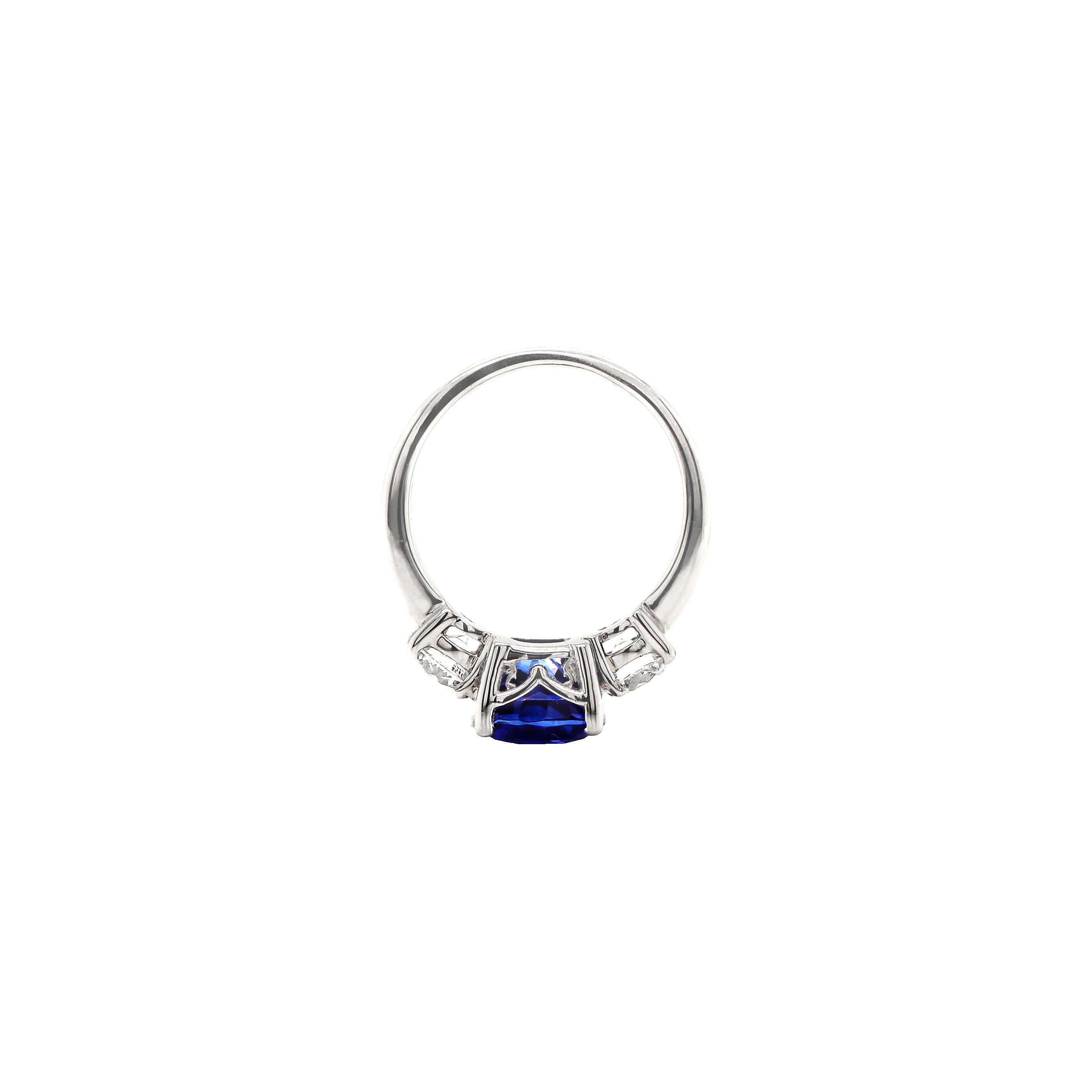 Women's 4.09 Carat Cushion Sapphire and Diamond Three-Stone Platinum Engagement Ring For Sale