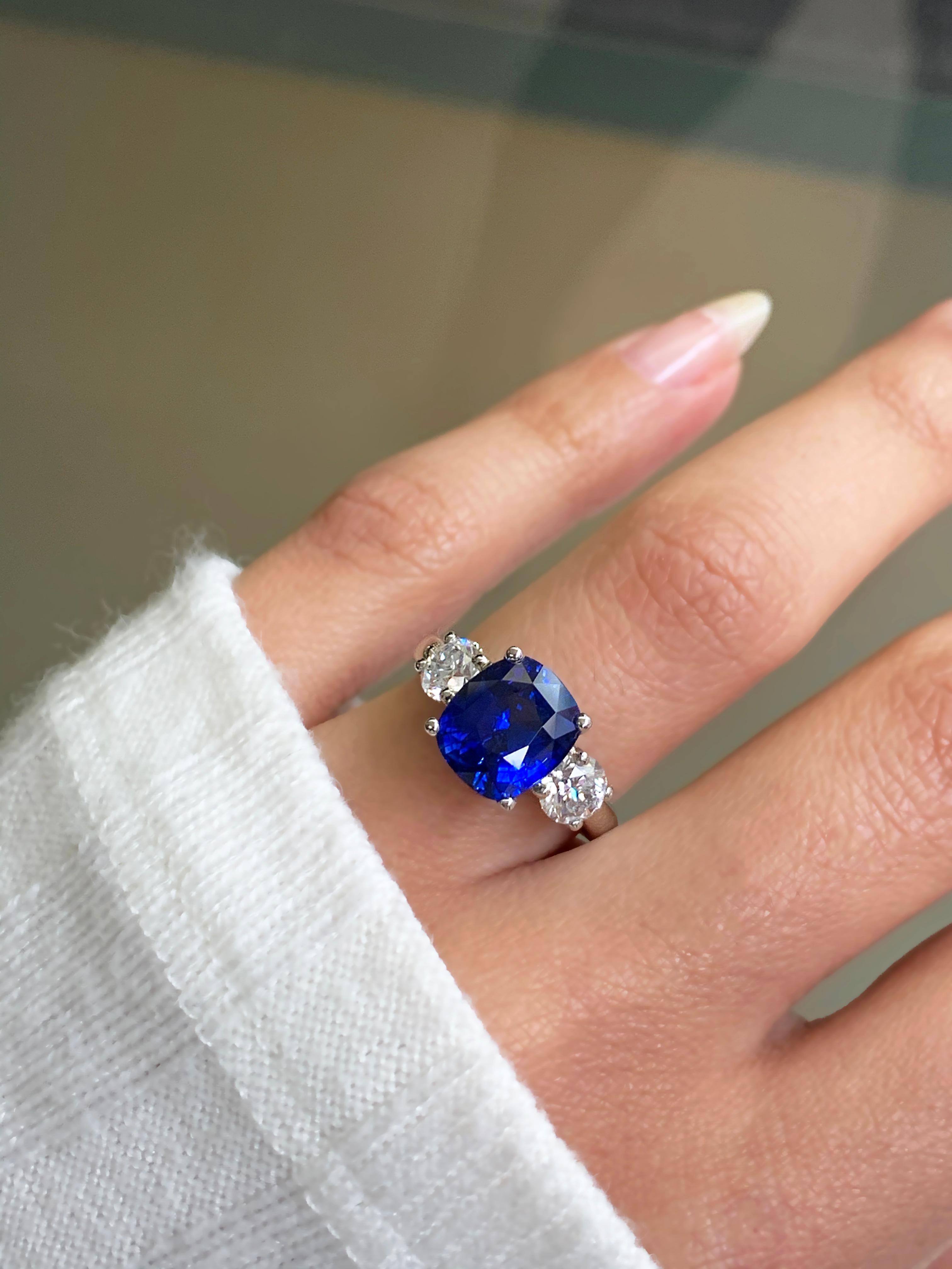 4.09 Carat Cushion Sapphire and Diamond Three-Stone Platinum Engagement Ring For Sale 1