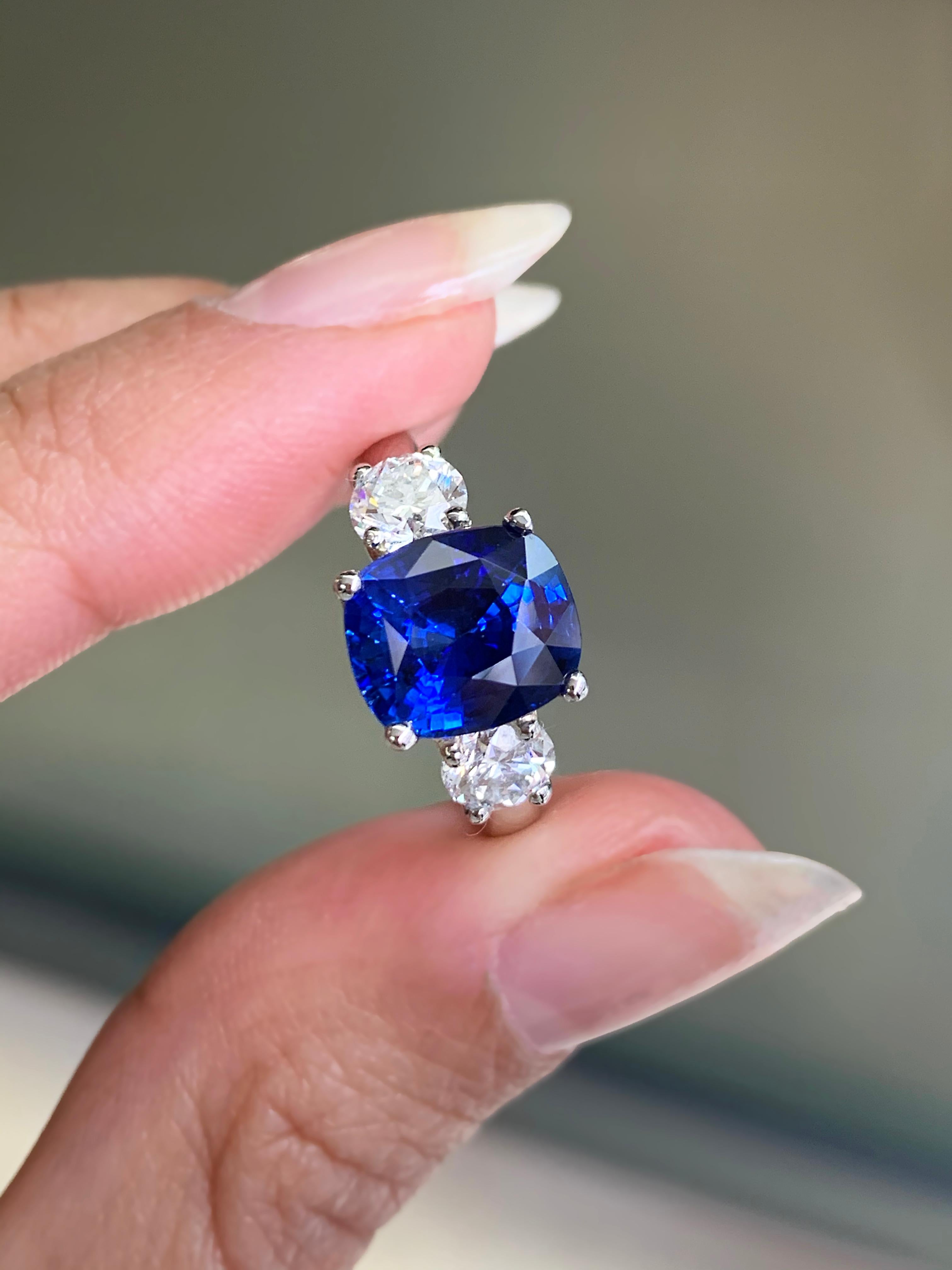 4.09 Carat Cushion Sapphire and Diamond Three-Stone Platinum Engagement Ring For Sale 2