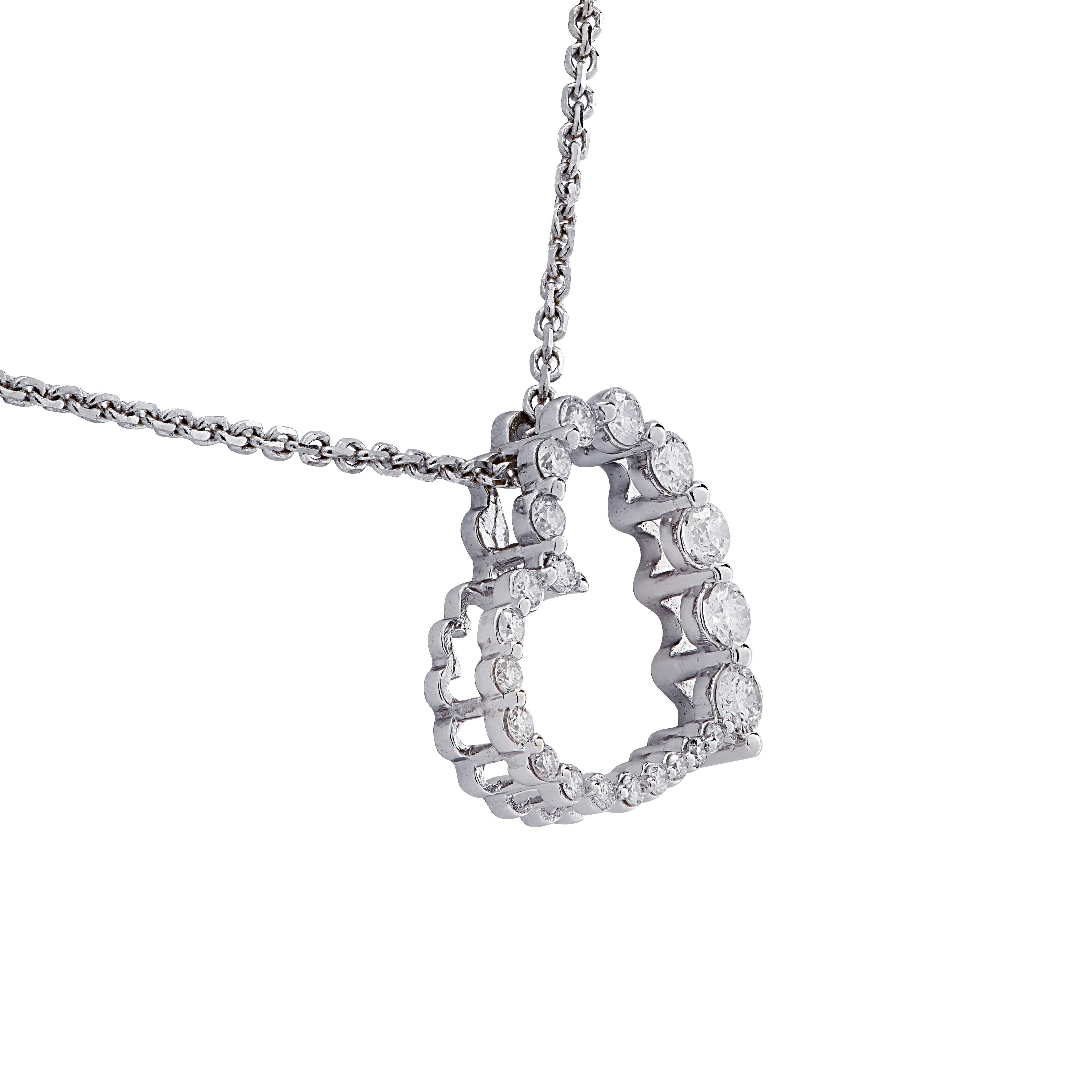 Enchanting open heart diamond pendant crafted in white gold, featuring 22 round brilliant cut diamonds, graduating in size, weighing approximately .40 carats total, G color, SI clarity. The pendant measures .5 of an inch in length and .6 of an inch