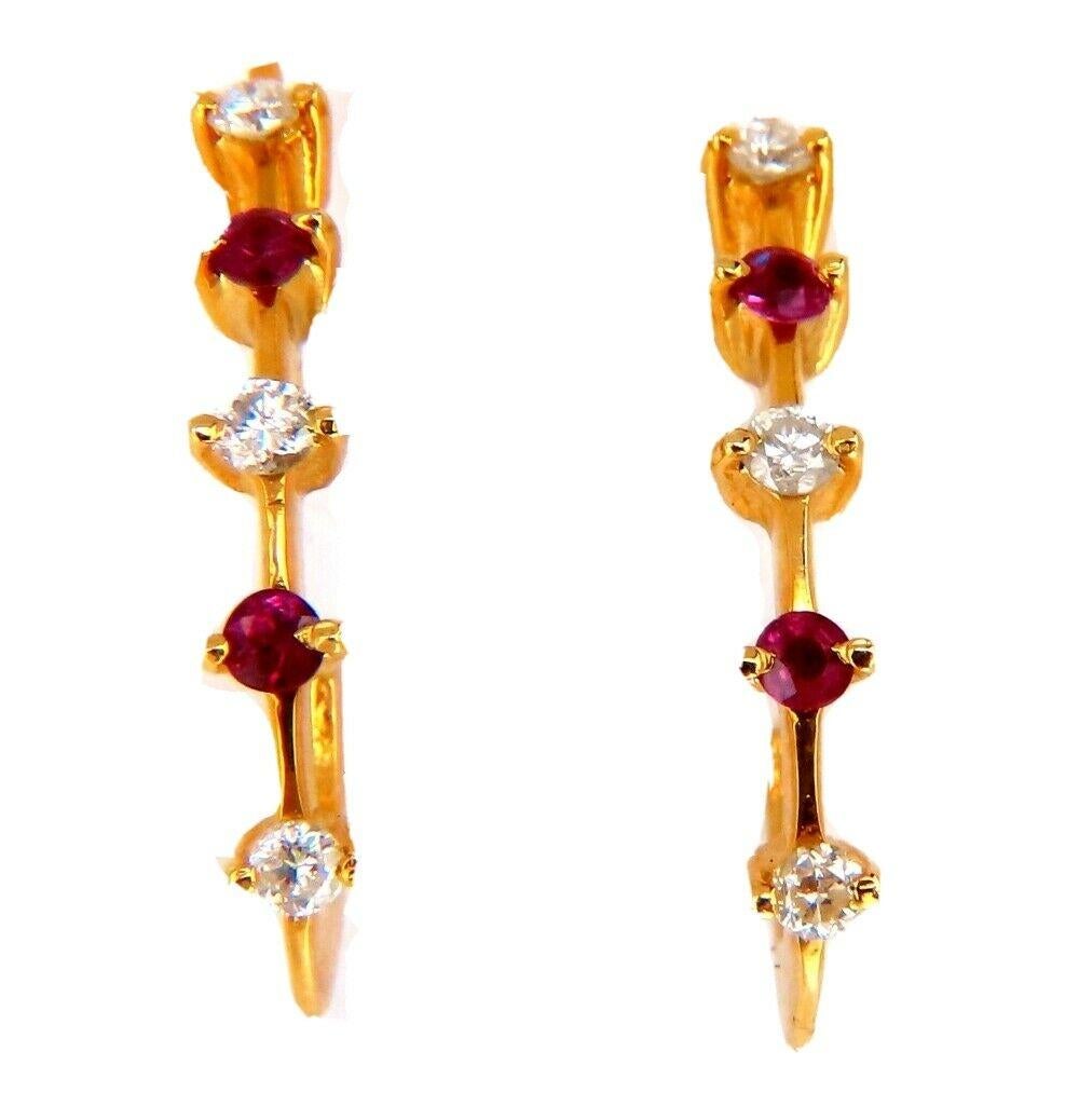 Ruby diamond semi hoop earrings

.20ct.  rubies, full brilliant cut clean clarity and transparent

.20ct. natural round diamonds h color vs2 clarity.

14 karat hello gold 2.9 g

Earrings measure 23 mm long

13.5mm wide (front to back)

3.7 mm wide