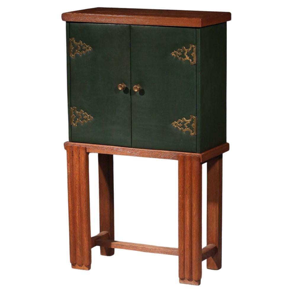 40's cabinet furniture in brushed wood and leather