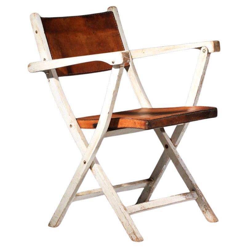 40's folding chair in leather and lacquered wood
