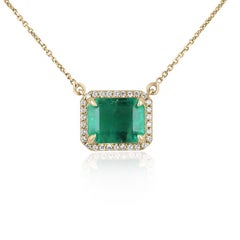 4.0tcw Natural Emerald-Emerald Cut & Diamond Halo Necklace Solid Gold Horizontal