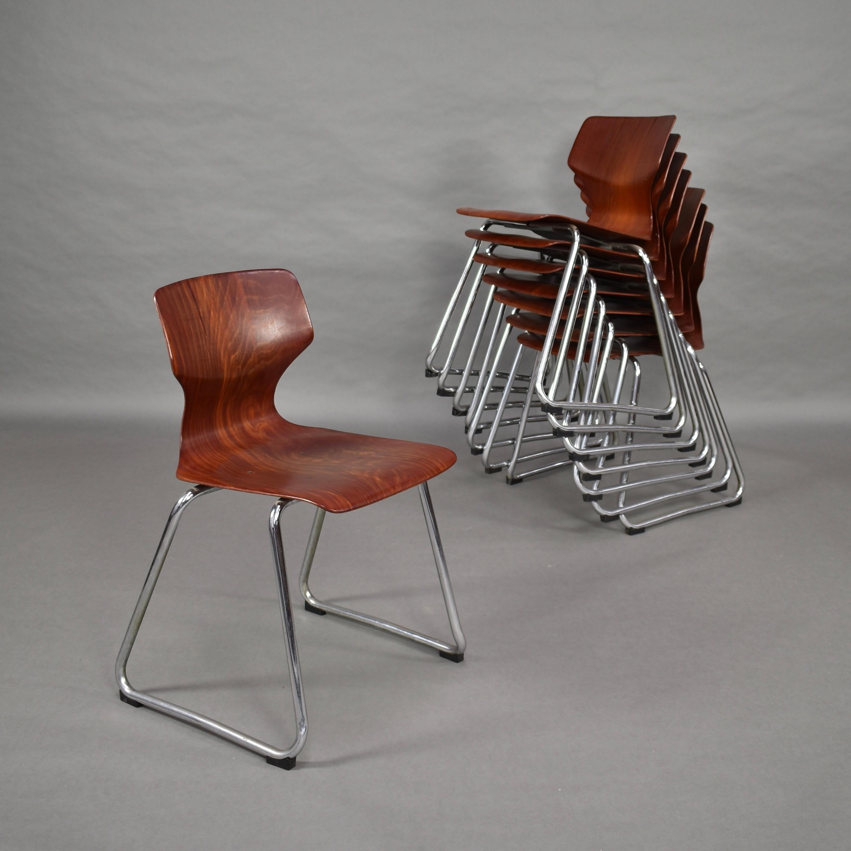 Original Elmar Flötotto school stacking chairs with plywood seats and chromed base.
Design by Adam Stegner.
Approximately 40 available.
In very good condition.