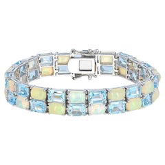 41-4/5 ct. Bracelet en argent sterling taillé en émeraude, topaze bleu ciel et opale octogonale