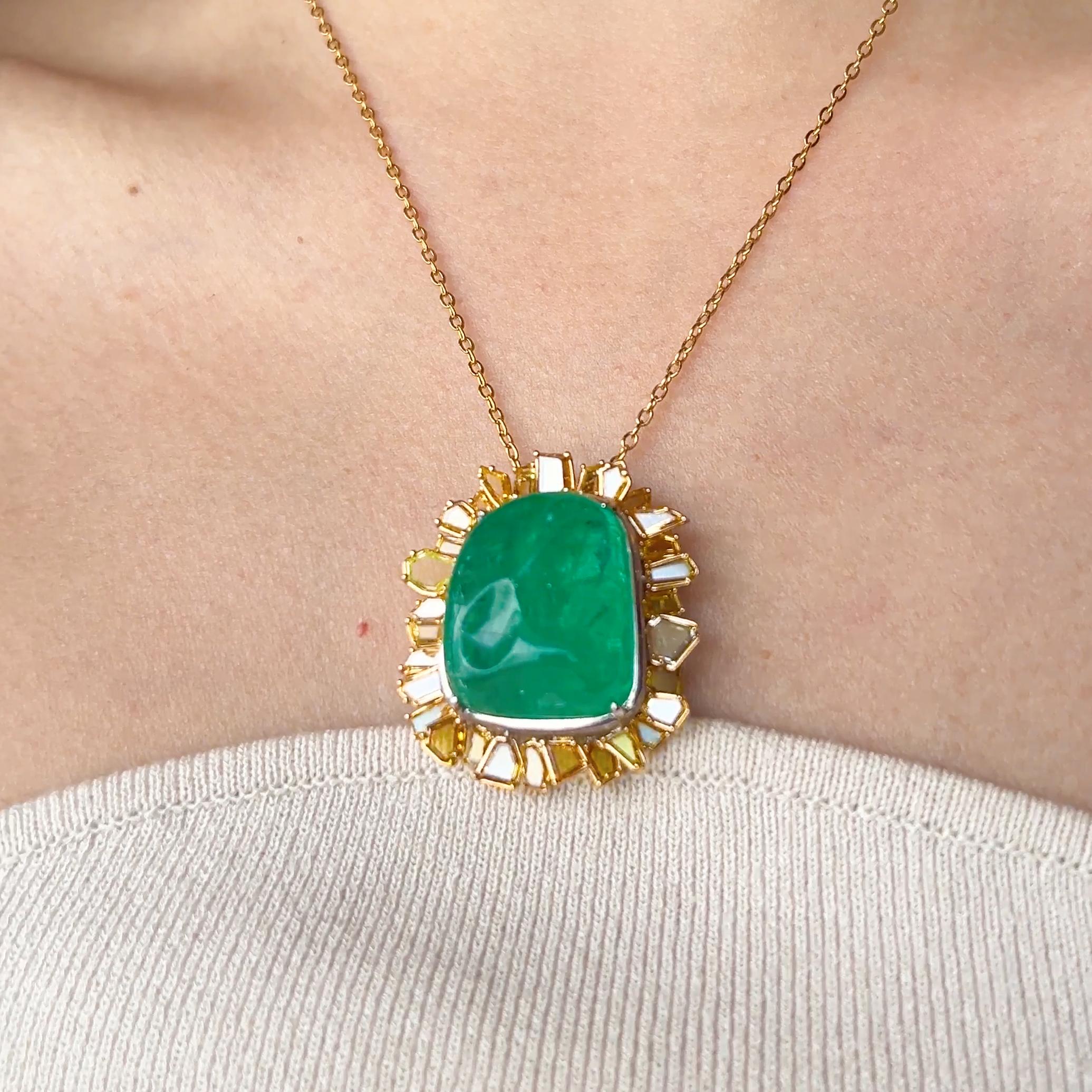 41 Carat Emerald & 4.37 Carat Fancy Color Diamond 