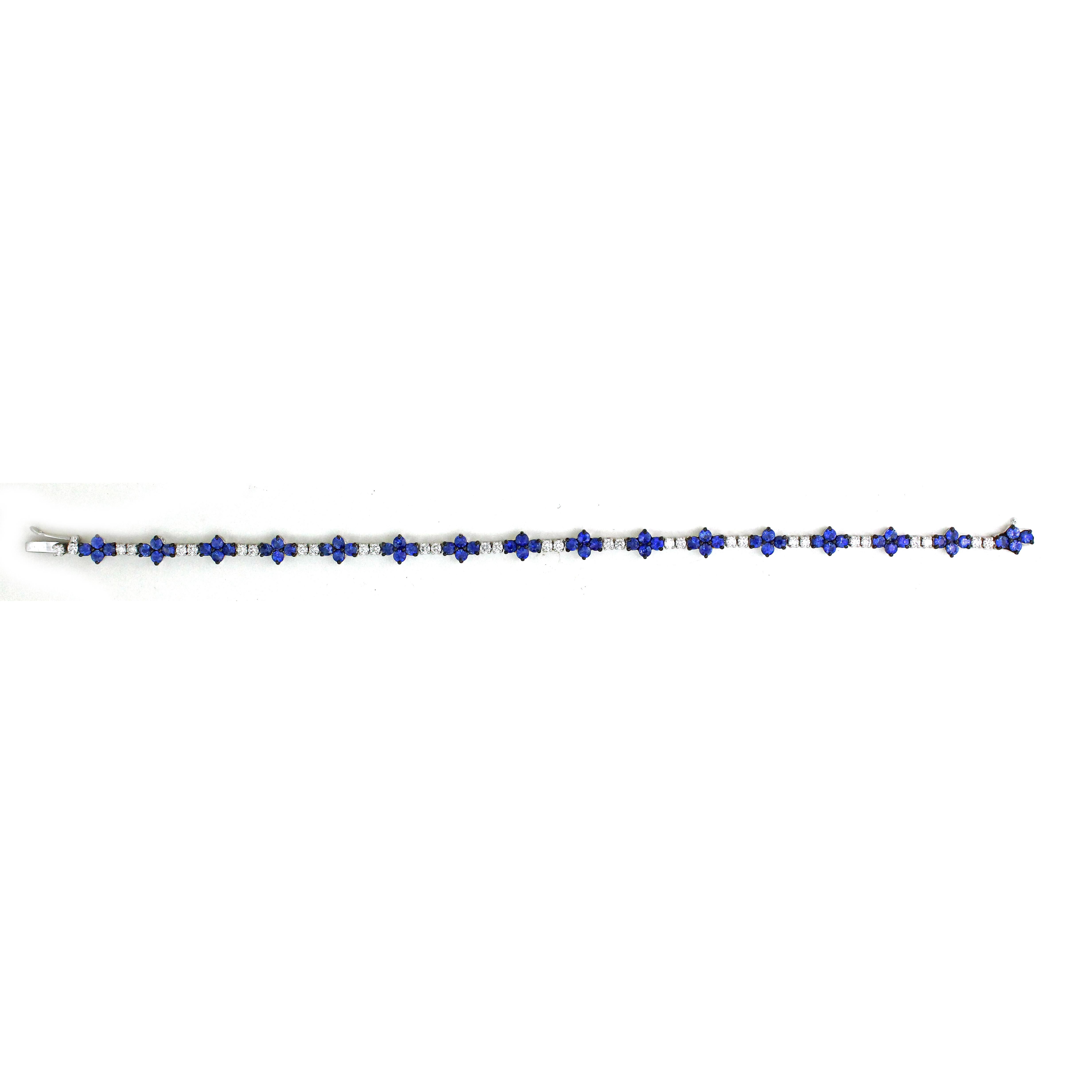 Experience the allure of celestial elegance with our stunning bracelet, a masterpiece that captures the essence of starlit nights and timeless beauty. Adorned with 64 resplendent blue round sapphires, totaling an impressive 4.1 carats.
Intertwined
