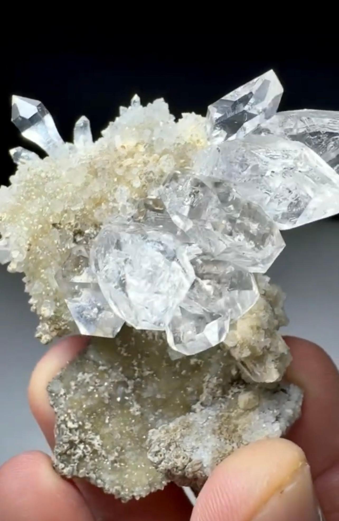 Product Information:

Specimen Type: Diamond Quartz on Calcite

Weight: 41 grams

Dimension: H: 6 x W: 6 x D: 3 cm

Origin: Wadh Mine, Khuzdar District, Balochistan Province, Pakistan 

Treatment: None

Description: 

This striking specimen features