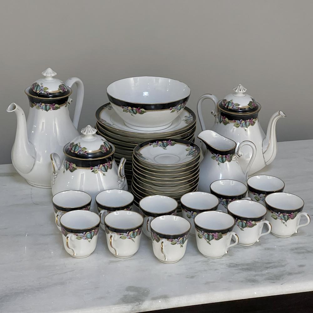 41-Piece 19th century Vieux-Paris coffee & tea service is a stunning collection that will let you entertain in style! Each piece is carefully crafted from fine porcelain, then hand-painted with the utmost in care and artistry depicting vine and