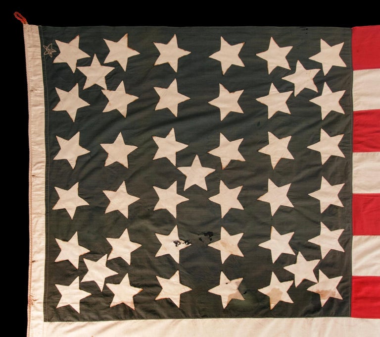 41 STARS IN A LINEAL PATTERN WITH OFFSET STARS THAT CREATE A CROSSHATCH IN THE CORNERS AND CENTER, ONE OF THE RAREST STAR COUNTS AMONG SURVIVING FLAGS OF THE 19TH CENTURY, REFLECTS MONTANA STATEHOOD IN NOVEMBER, 1889, ACCURATE FOR JUST 3