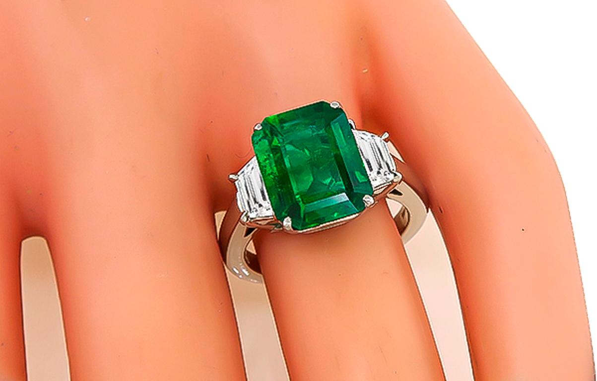 emerald and diamond platinum ring