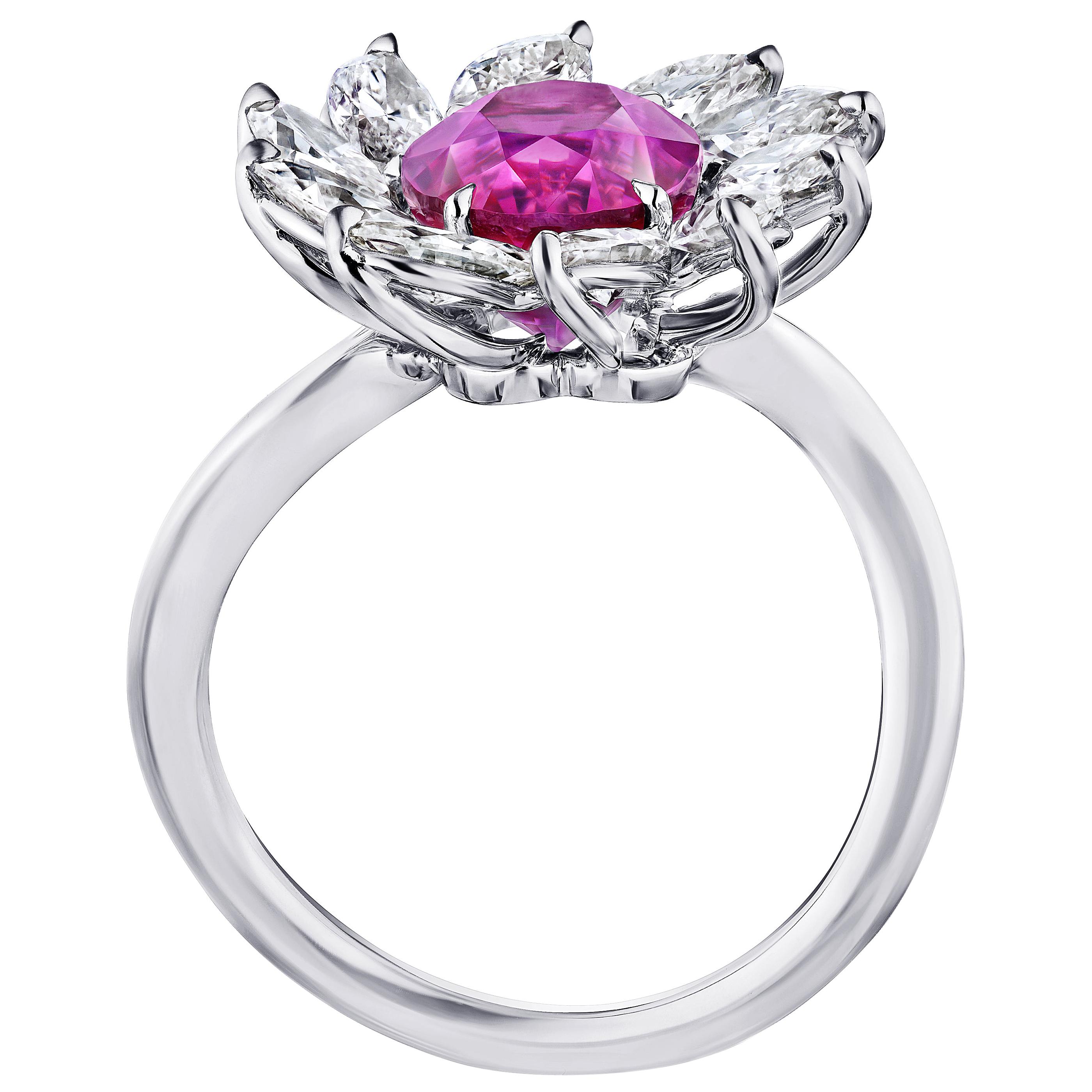4.10 carat oval red ruby with ten marquise diamonds 2.18 carats set in a platinum ring Size 7.
