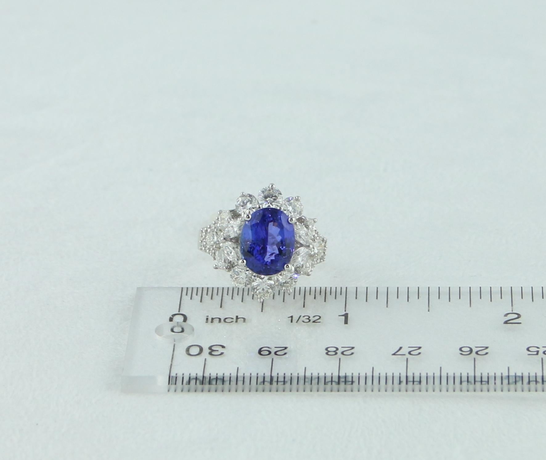 4.10 Carat Oval Tanzanite Diamond Gold Ring For Sale 3