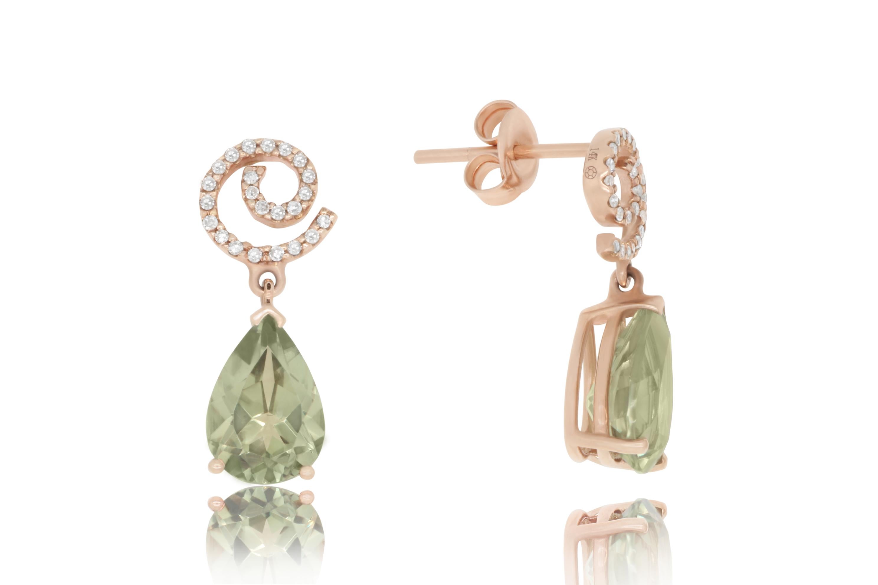 Flirty & Fun! These Color Changing Diaspore decent from swirls of white diamonds. We absolutely love their charm and elegance! 
This new gemstone was discovered and mined in Turkey’s Anatolian Mountains. Under natural light, it appears green with