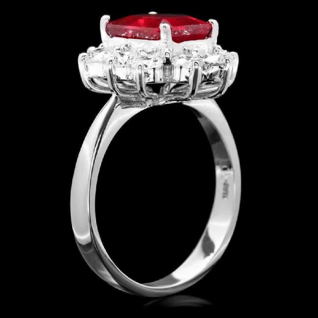 4.10 Carats Impressive Natural Red Ruby and Diamond 14K White Gold Ring

Total Red Ruby Weight is: Approx. 3.00 Carats

Ruby Measures: Approx. 9.00 x 7.00mm

Ruby Treatment: Lead Glass Filling

Natural Round Diamonds Weight: Approx. 1.10 Carats
