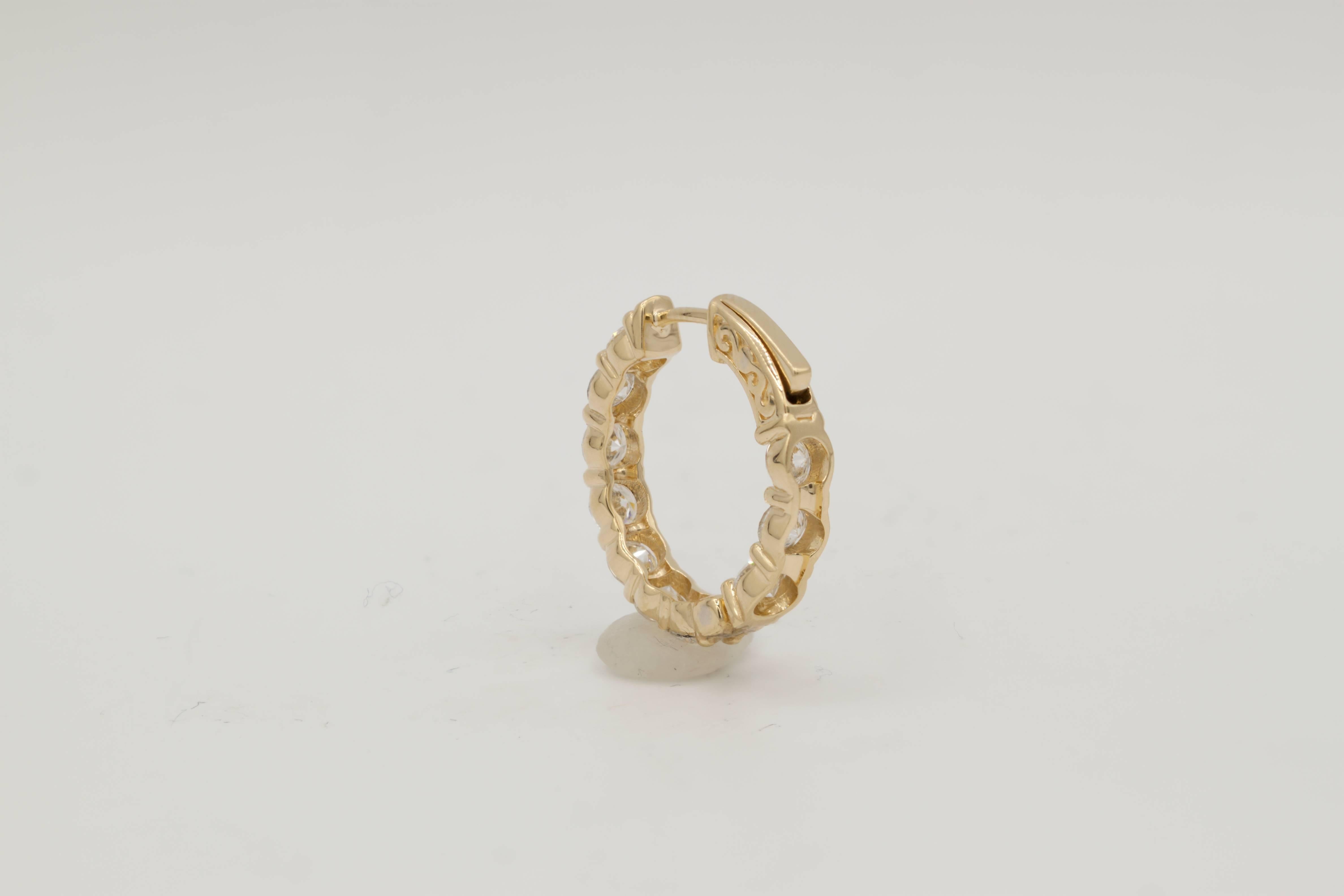 One 18K Yellow Gold diamond Hoop earrings features:
- 4.30 Carats of Round cut Diamonds. 
- 20 Round Cut Diamonds
- Each stone 0.20 Carats
- Oval Shaped
- 1