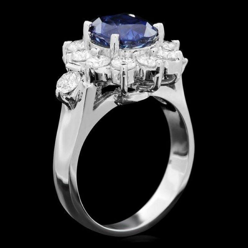4.10 Carats Natural Blue Sapphire and Diamond 14K Solid White Gold Ring

Total Blue Sapphire Weight is: Approx. 2.90 Carats

Natural Sapphire Measures: Approx. 9.00 x 7.00mm

Sapphire treatment: Diffusion

Natural Round Diamonds Weight: Approx. 1.20