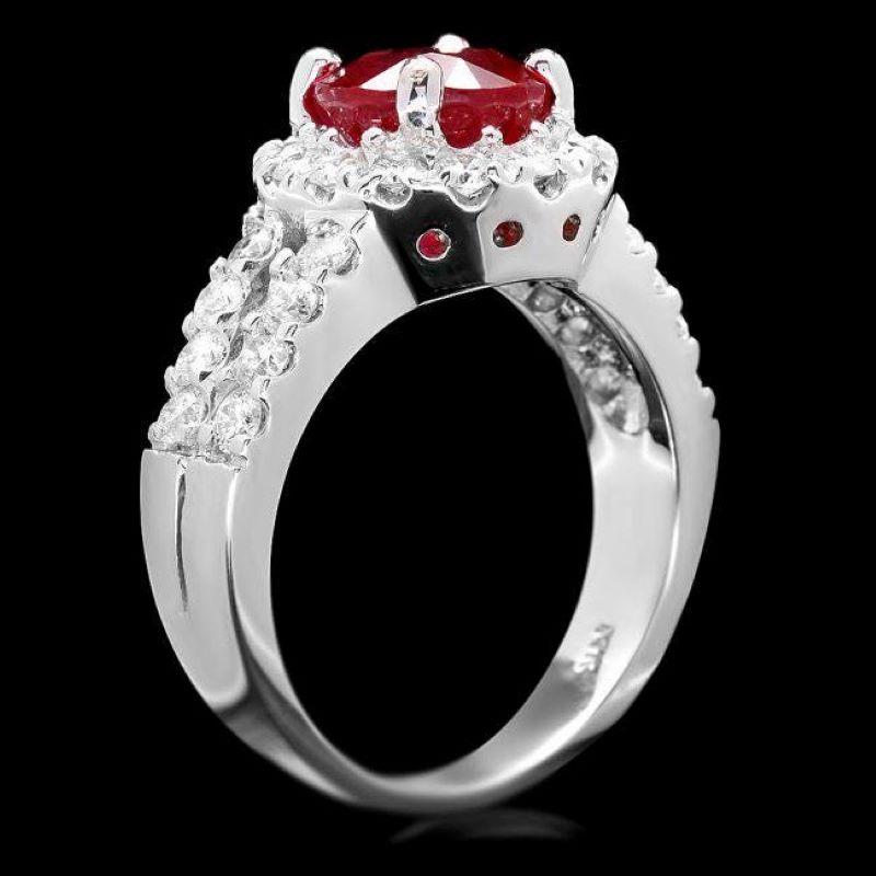 4.10 Carats Natural Red Ruby and Diamond 14K Solid White Gold Ring

Total Red Ruby Weight is: Approx.2.90 Carats

Round Shaped Ruby Measures: Approx. 8.00 mm

Ruby treatment: Fracture Filling

Natural Round Diamonds Weight: Approx. 1.20 Carats