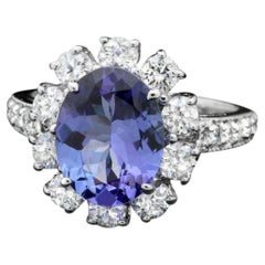 14 Karat massiver Weißgold Ring mit 4,10 Karat natürlichem Tansanit und Diamant