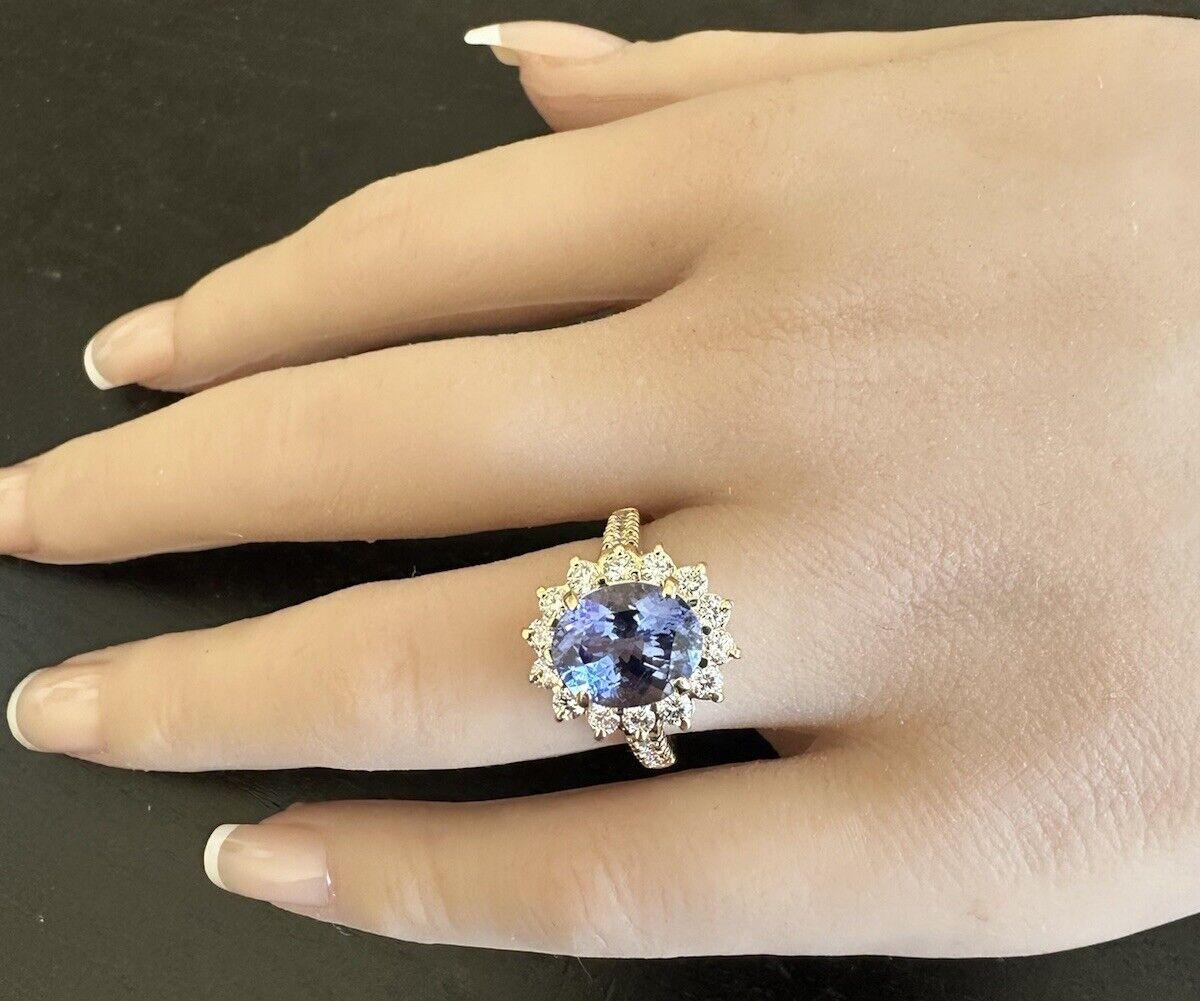 Anello in oro giallo massiccio 14K con tanzanite naturale e diamanti da 4,10 carati in vendita 1