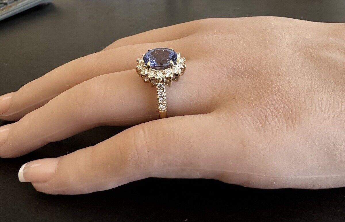 Anello in oro giallo massiccio 14K con tanzanite naturale e diamanti da 4,10 carati in vendita 2