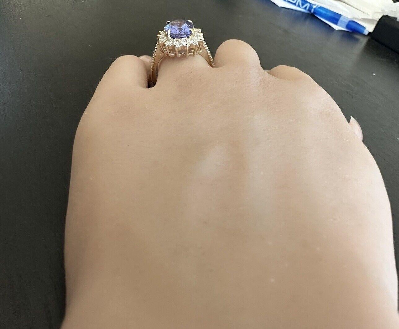 Anello in oro giallo massiccio 14K con tanzanite naturale e diamanti da 4,10 carati in vendita 3