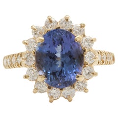 Ring aus 14K massivem Gelbgold mit 4,10 Karat natürlichem Tansanit und Diamant