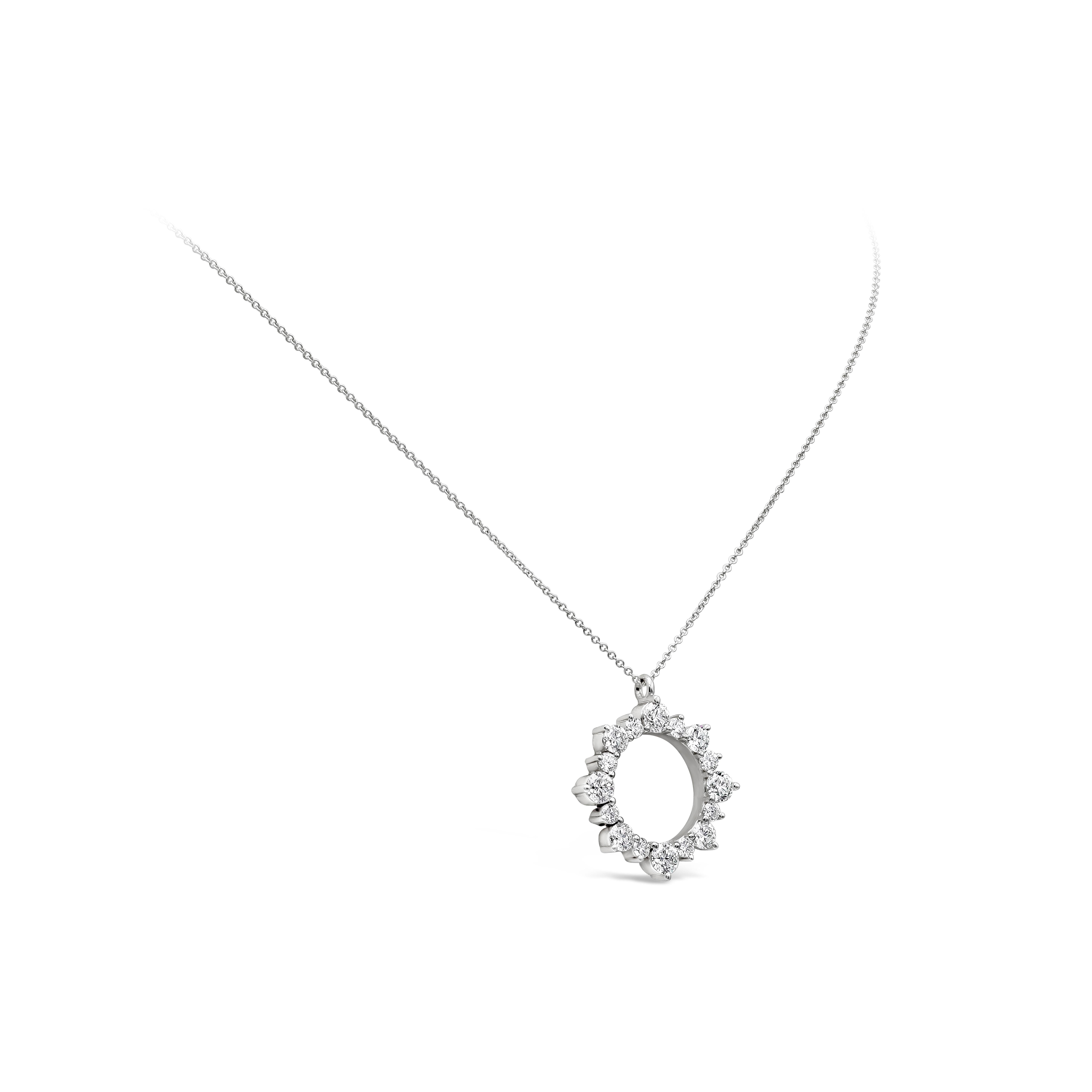 A stylish pendant necklace showcasing a row of 16 bright round diamonds,  set in an open-work, circular design. Diamonds weighs 4.10 carats total and are approximately G color, VS clarity. Made in 18 karats white gold.

Roman Malakov is a custom