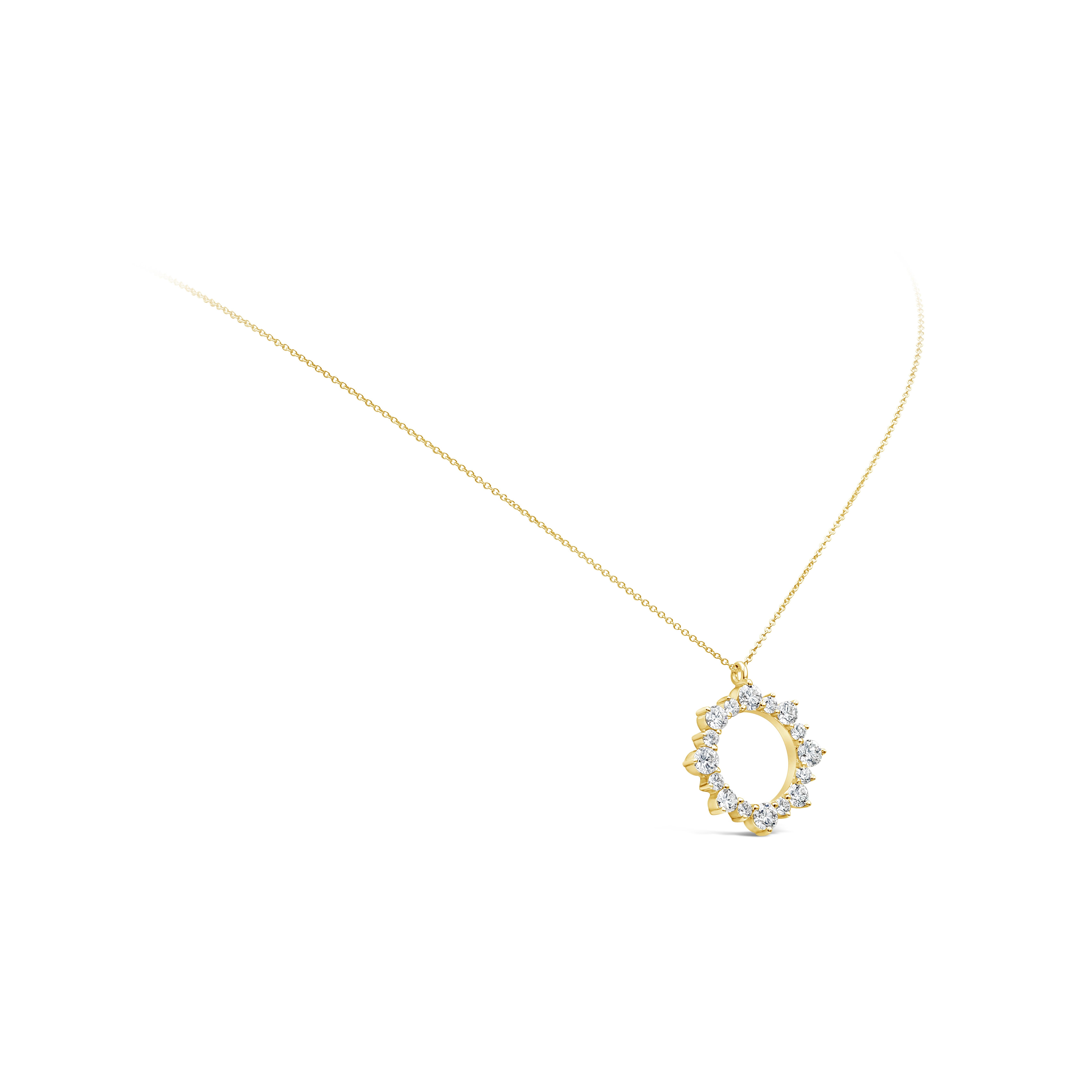 A stylish pendant necklace showcasing a row of 16 bright round diamonds,  set in an open-work, circular design. Diamonds weighs 4.10 carats total and are approximately G color, VS clarity. Made in 18K yellow gold.

Roman Malakov is a custom house,