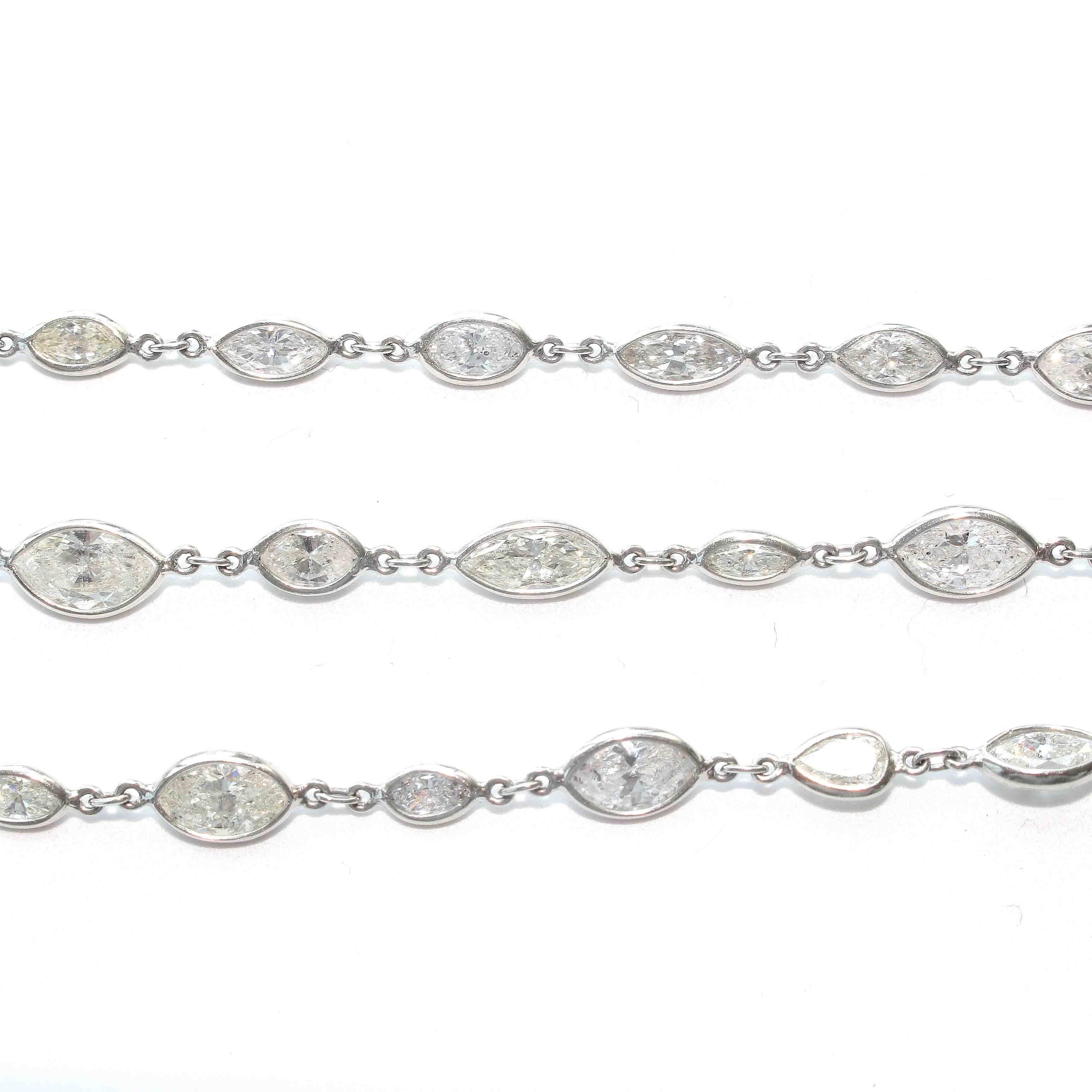 A lovely addition to any ensemble. Thats length of 55 inches allows an array of styles: a single long necklace, a double wrap and even a triple wrap necklace. Featuring 130 diamonds weighing 41.08 carats that are H-I color, SI+ clarity. Hand Crafted