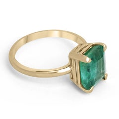 4.10ct 18K Four Prong Medium Mossy Green Emerald Cut Emerald Solitaire Ring