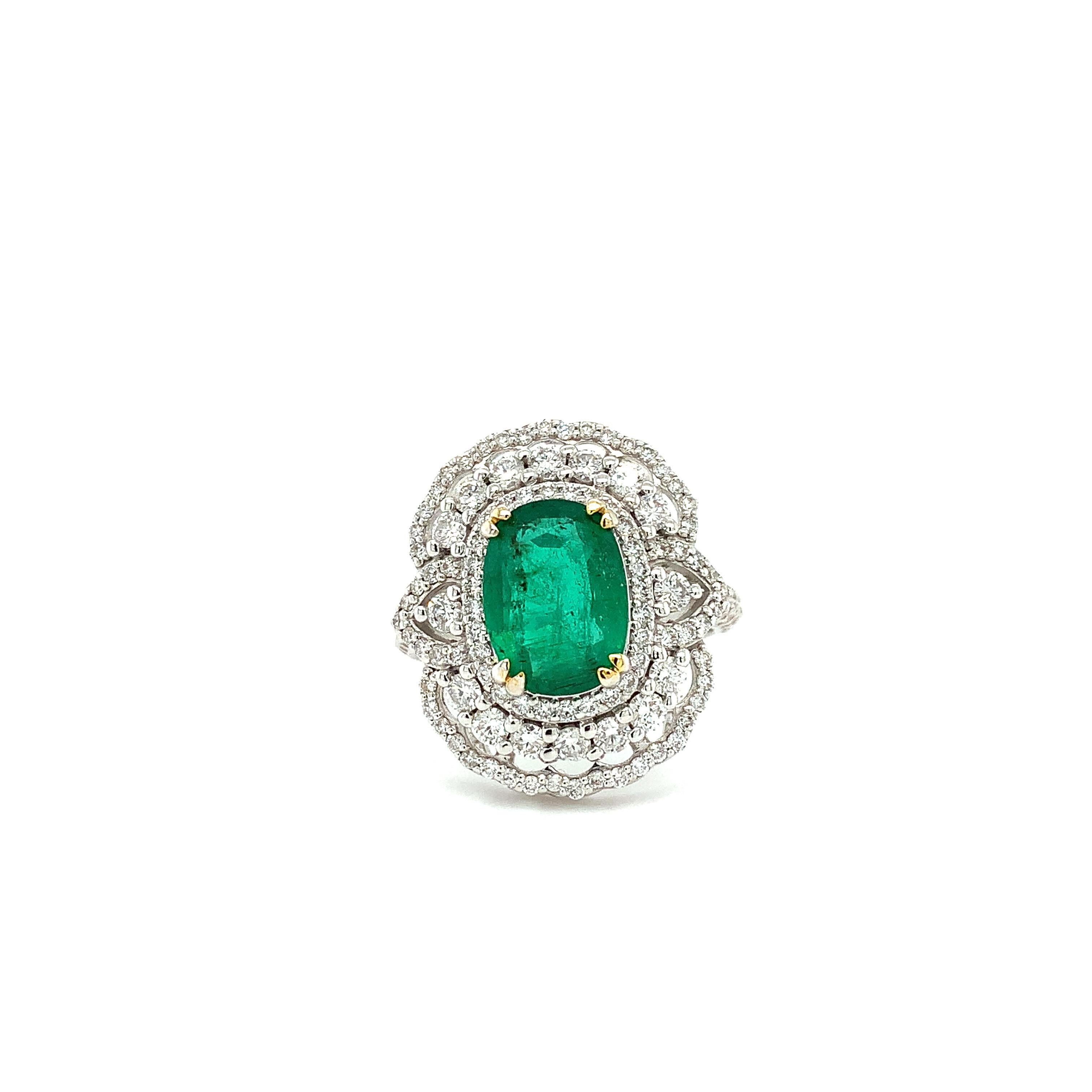 Contemporary 4.10ct Emerald and Diamond Halo Cocktail Ring 18ct White Gold For Sale